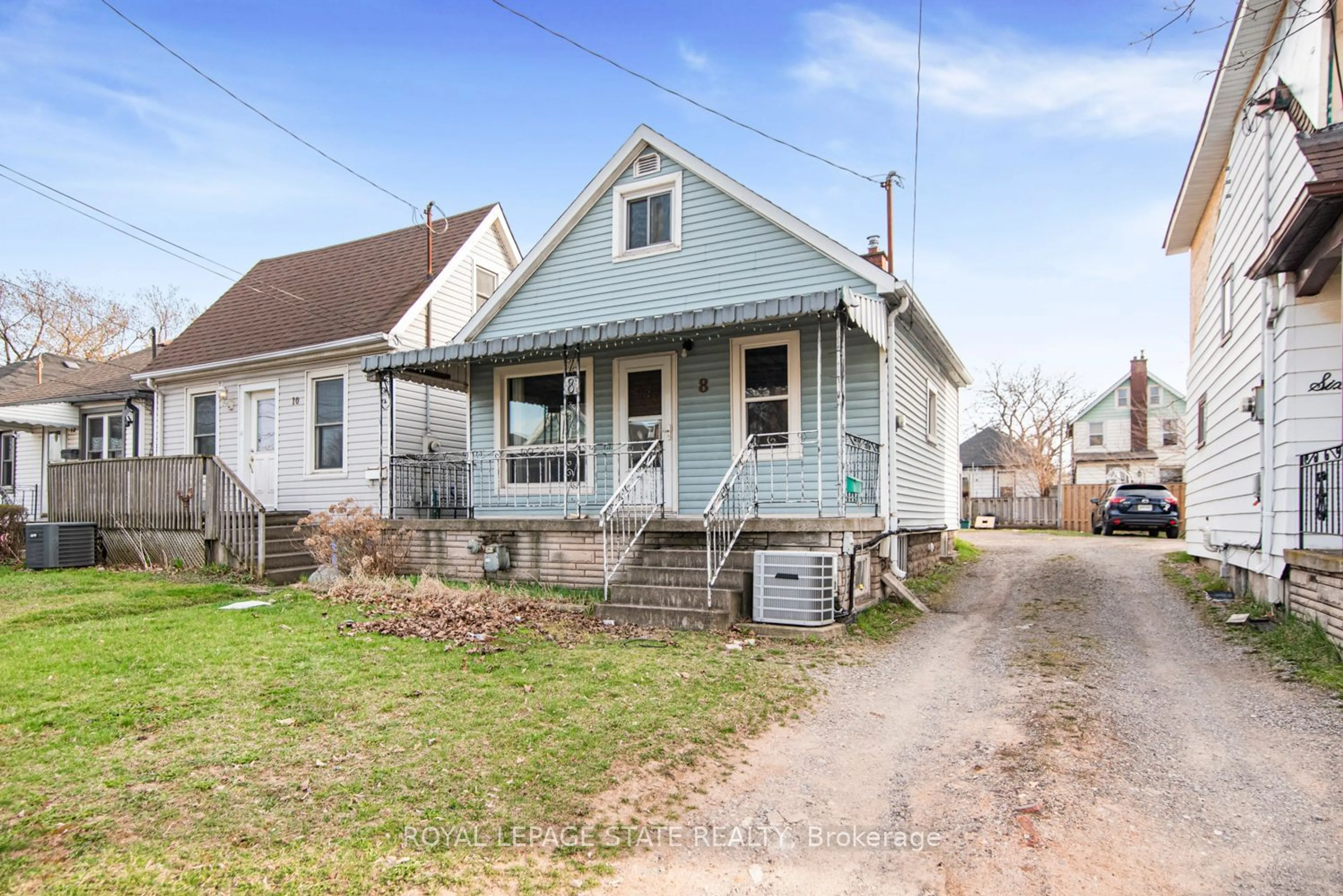 Frontside or backside of a home for 8 Merchison Ave, Hamilton Ontario L8H 3C9