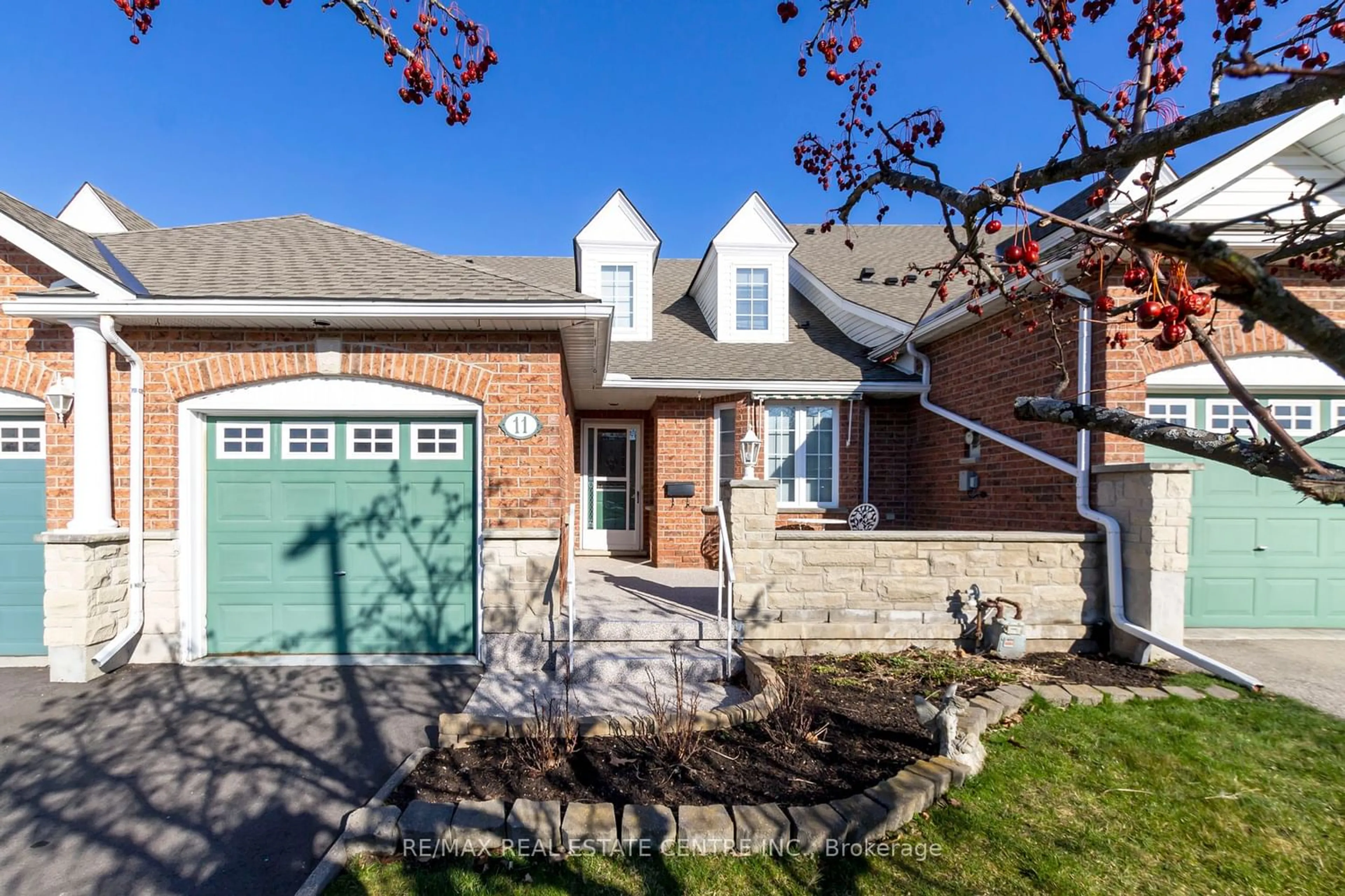 Home with brick exterior material for 11 Somerset Glen, Guelph Ontario N1G 5G1