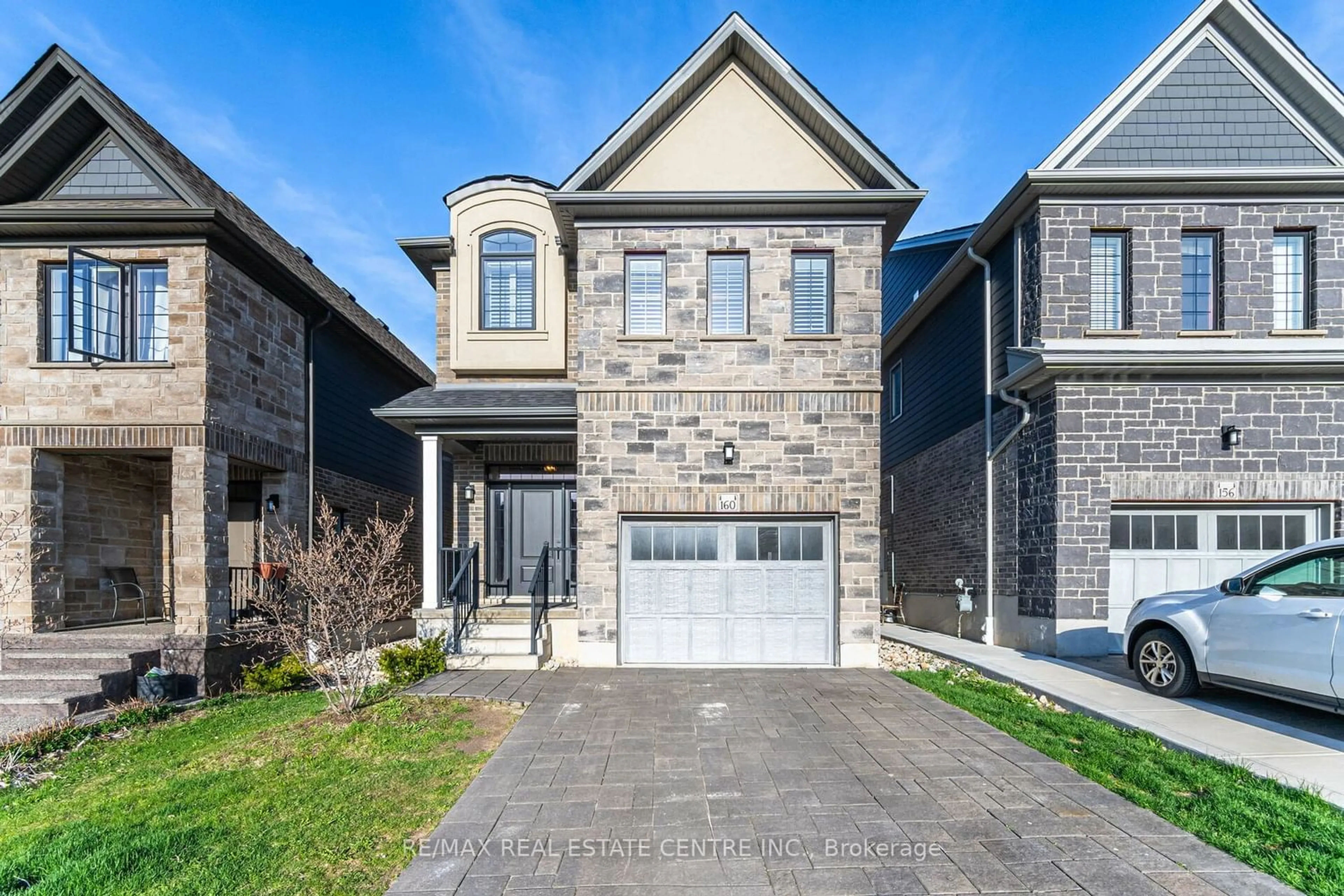 Home with brick exterior material for 160 Hollybrook Tr, Kitchener Ontario N2R 0M2
