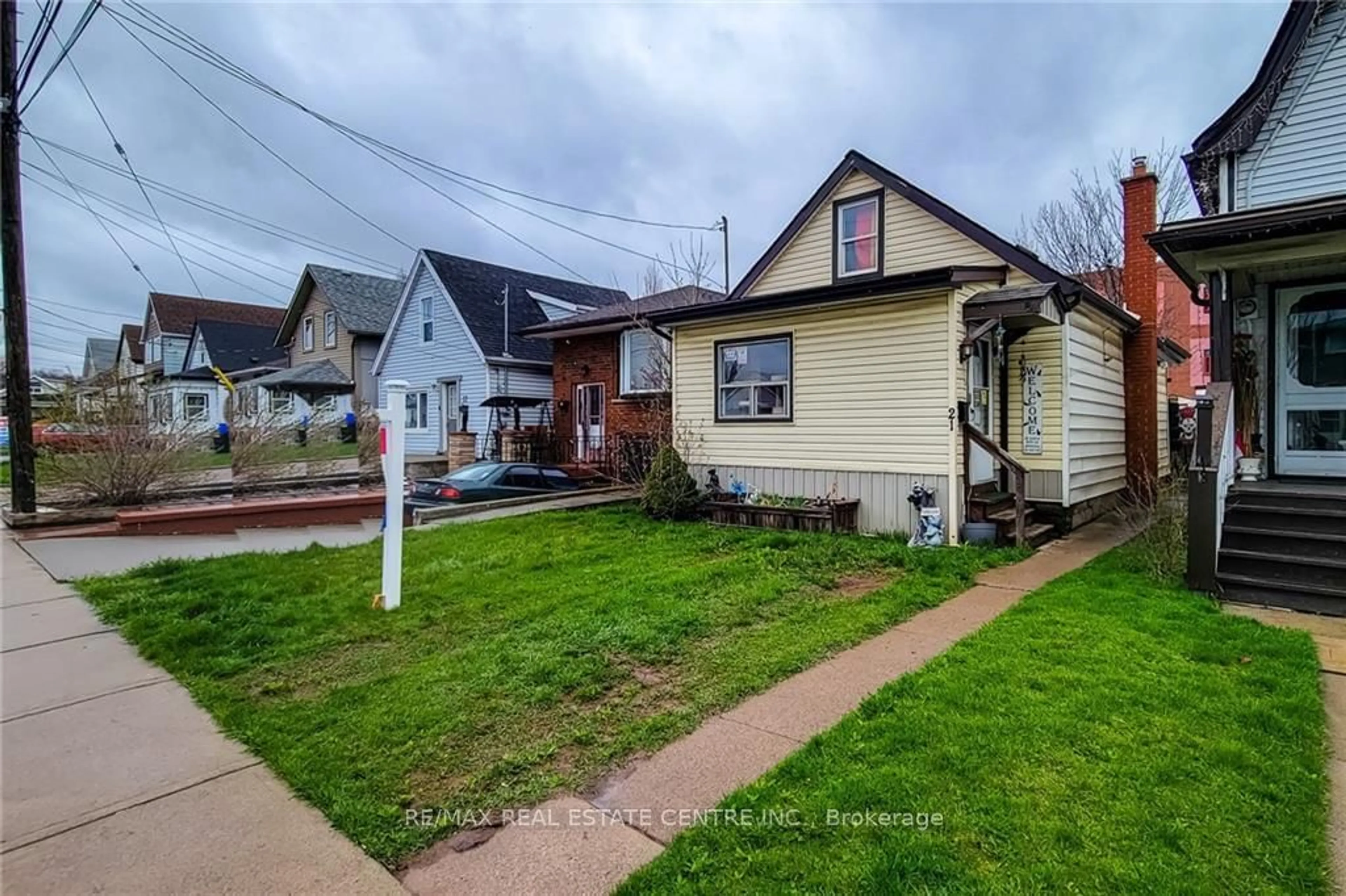 Frontside or backside of a home for 21 Frederick Ave, Hamilton Ontario L8H 4K1