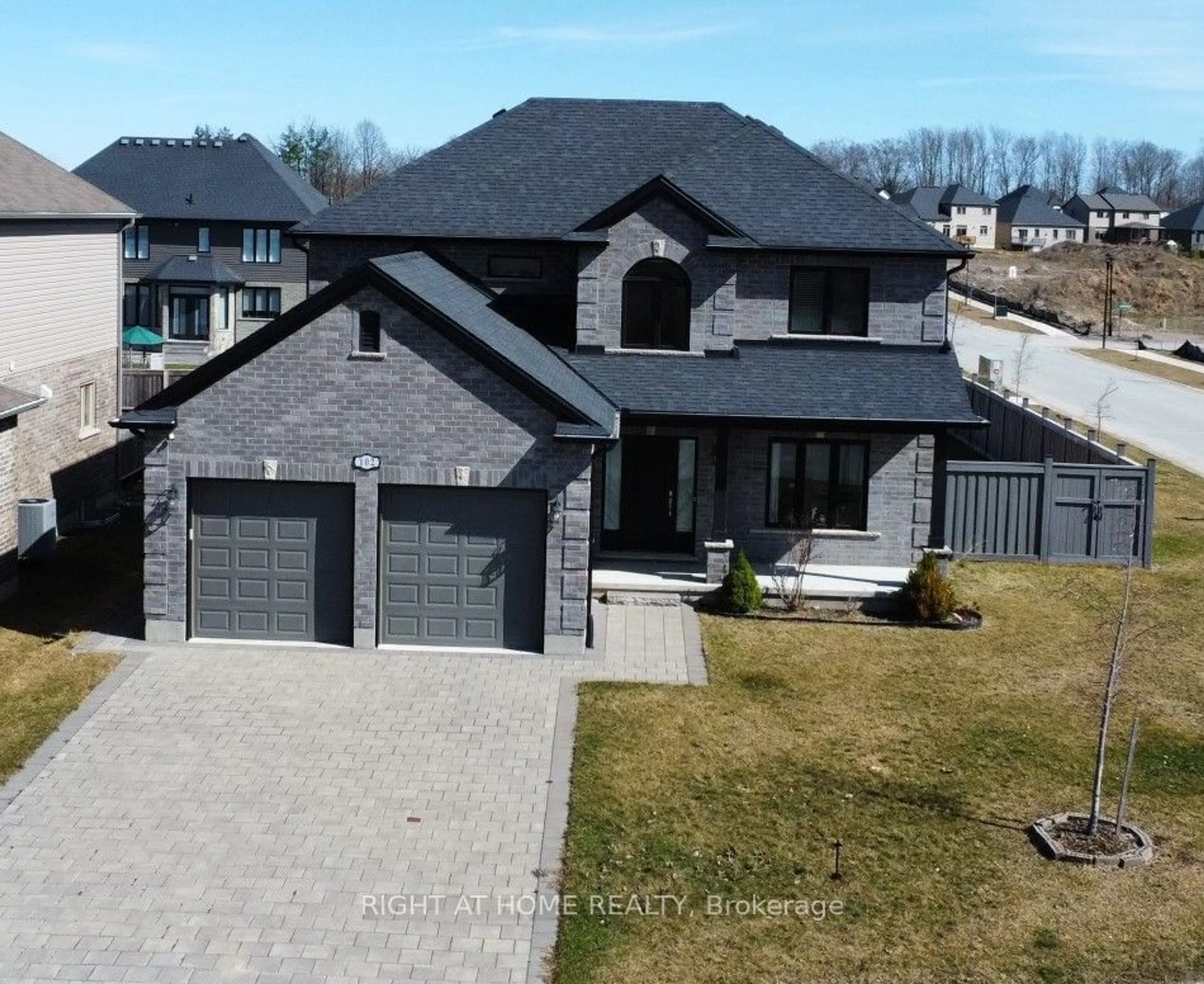 Home with brick exterior material for 102 Timberwalk Tr, Middlesex Centre Ontario N0M 2A0