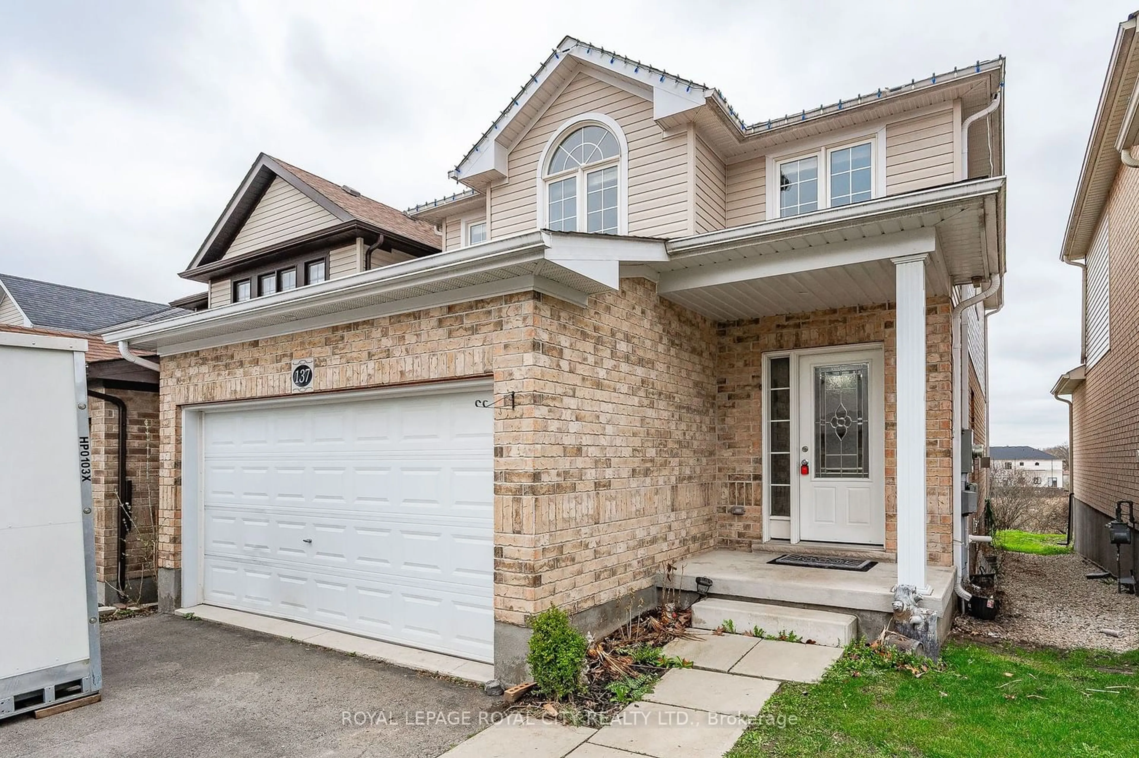 Frontside or backside of a home for 137 Kemp Cres, Guelph Ontario N1E 0K1