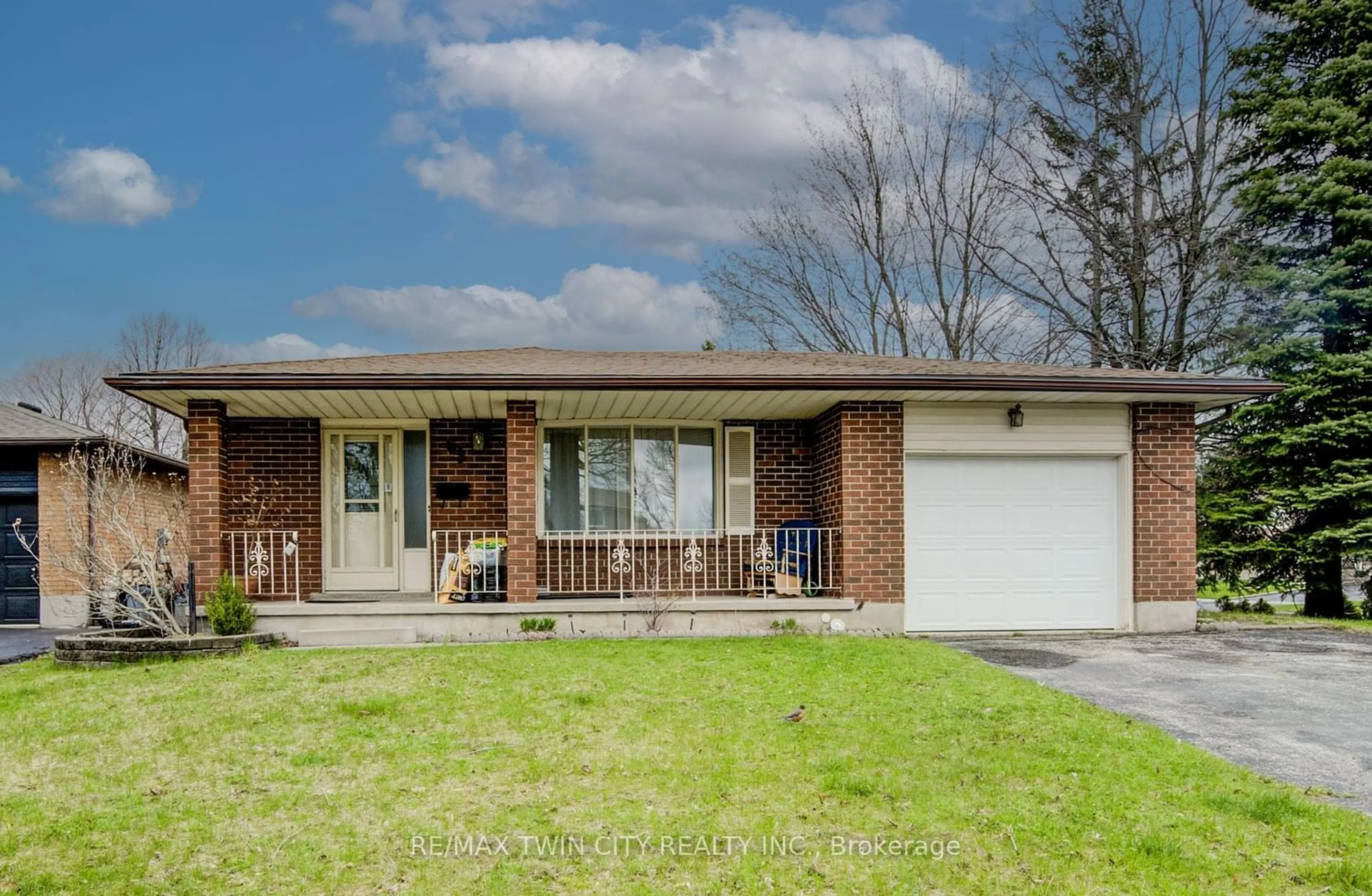 Home with brick exterior material for 63 Oldfield Dr, Kitchener Ontario N2A 3P3