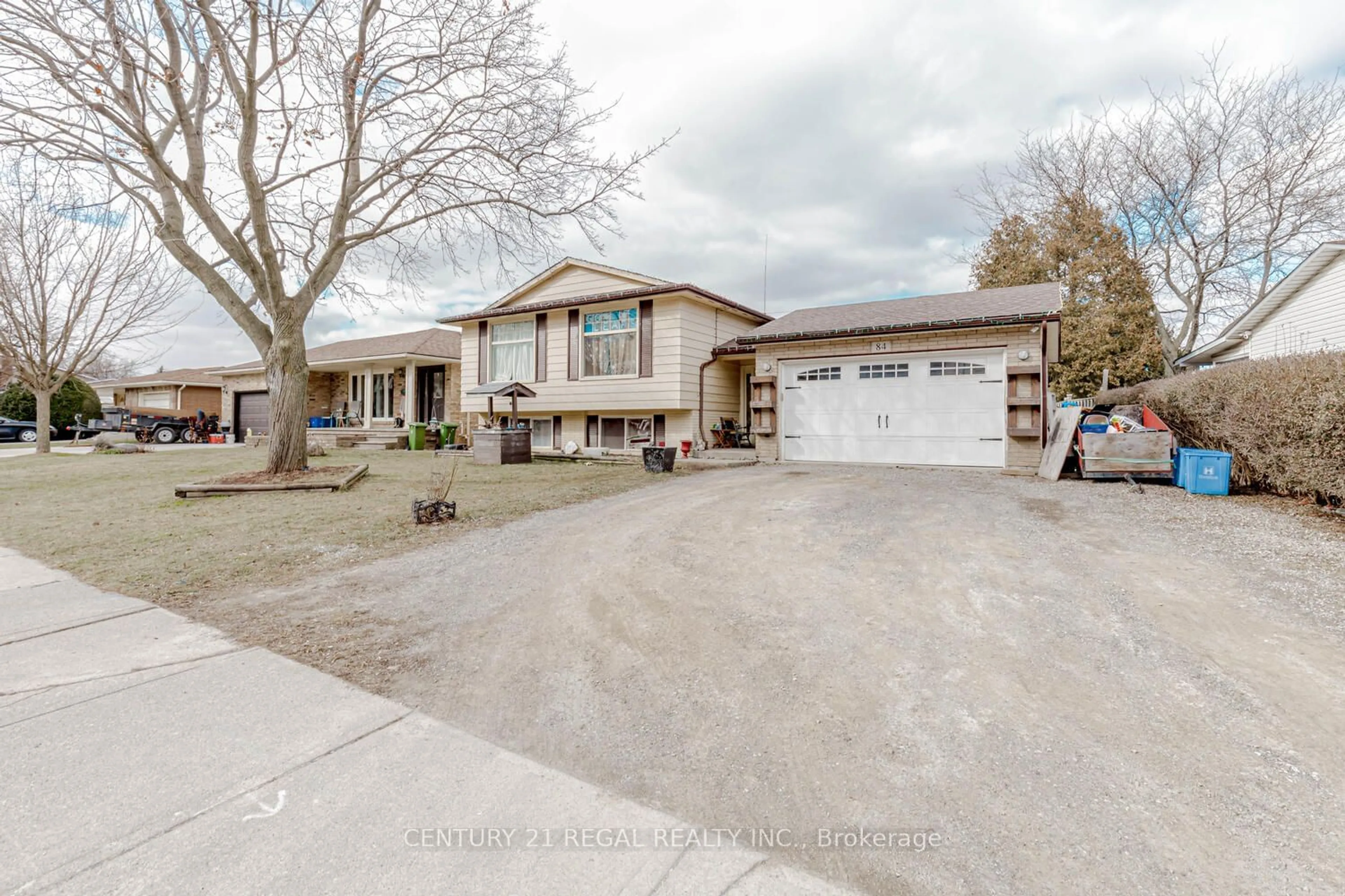 Frontside or backside of a home for 84 Elgar Ave, Hamilton Ontario L9C 4E5