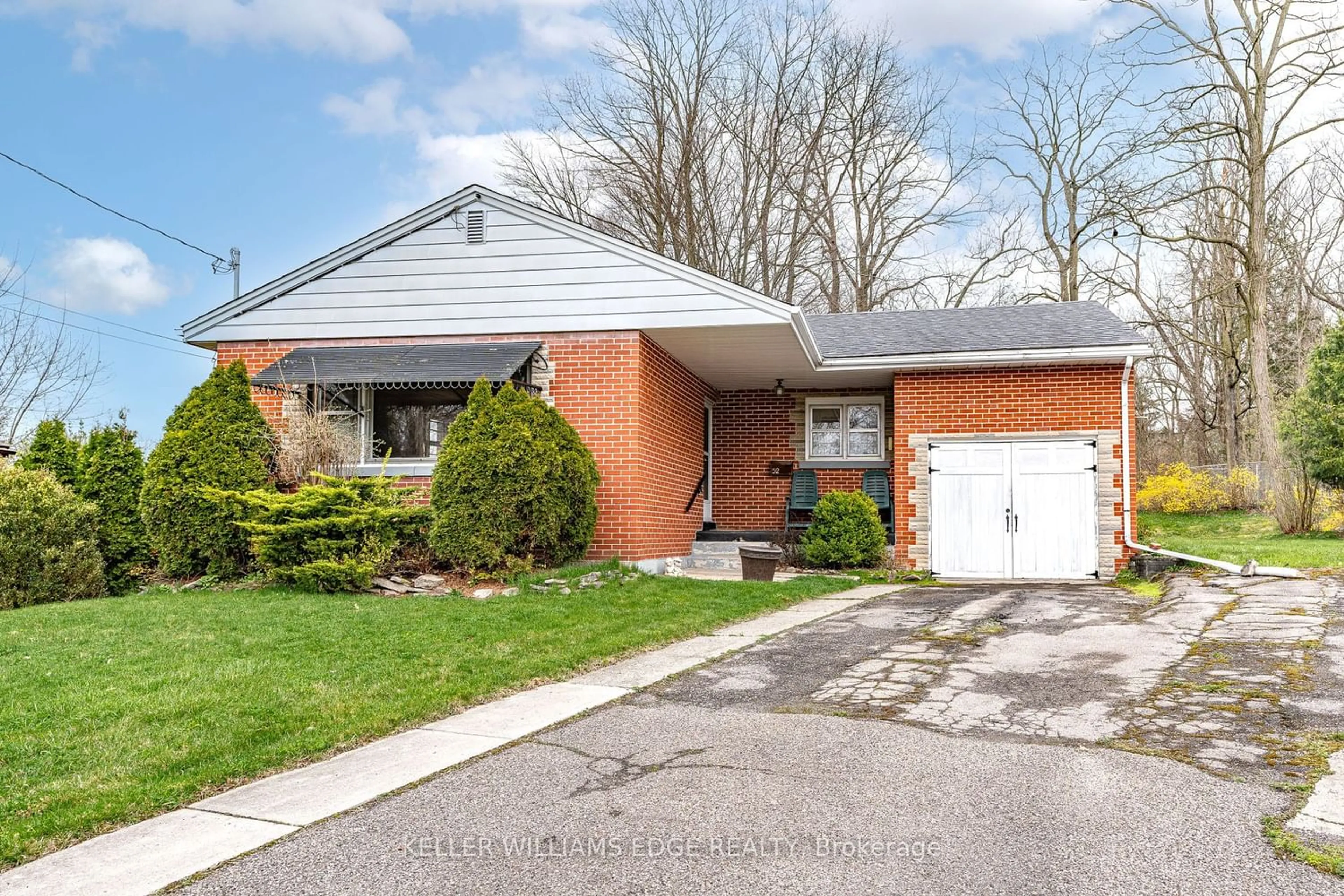 Home with brick exterior material for 52 Kemp Dr, Hamilton Ontario L9H 2M9