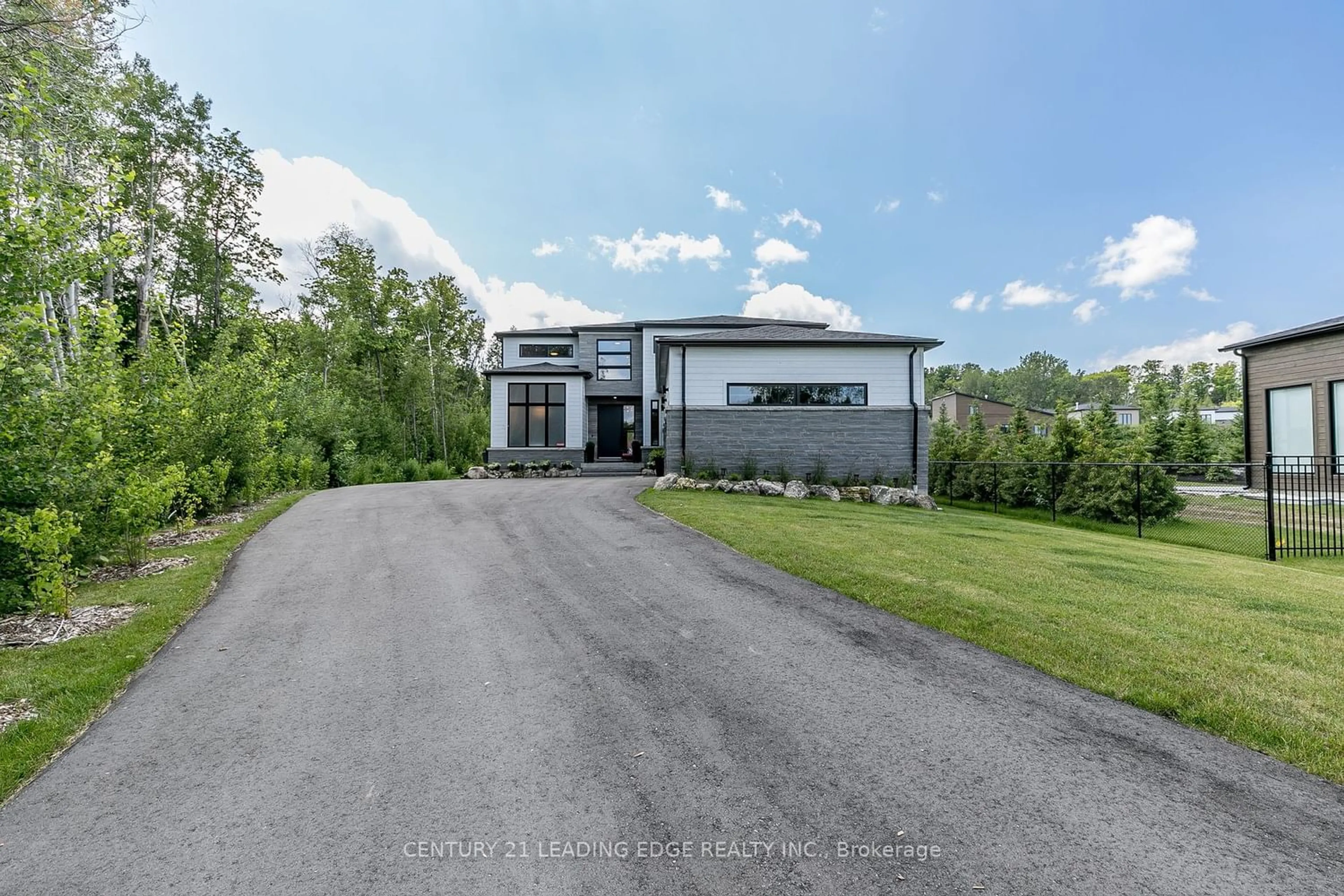 Frontside or backside of a home for 114 Tekiah Rd, Blue Mountains Ontario N0H 1J0