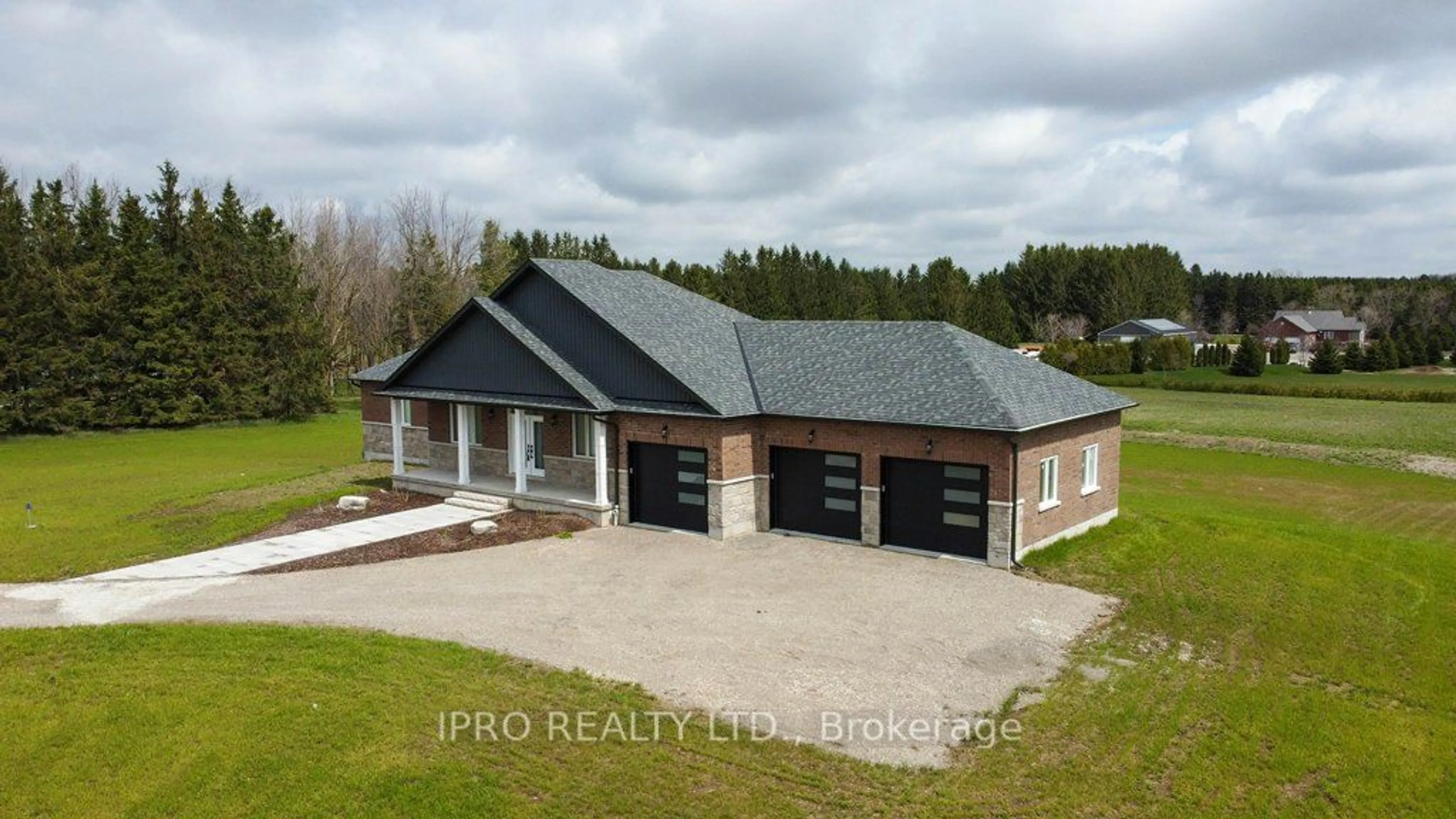 Home with brick exterior material for 311009 16th Line, East Garafraxa Ontario L9W 7C6