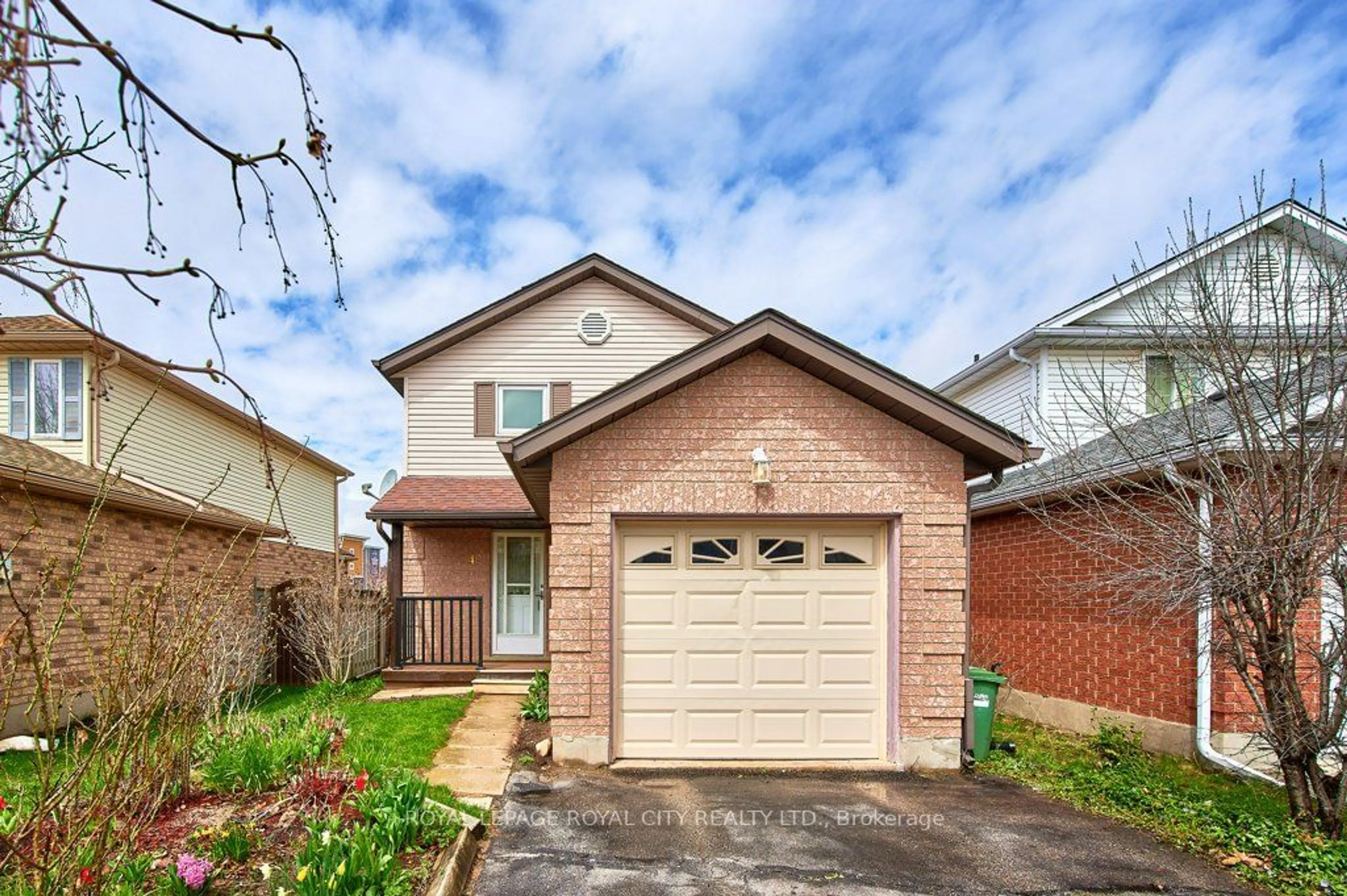 Frontside or backside of a home for 4 Bushmills Cres, Guelph Ontario N1K 1T5