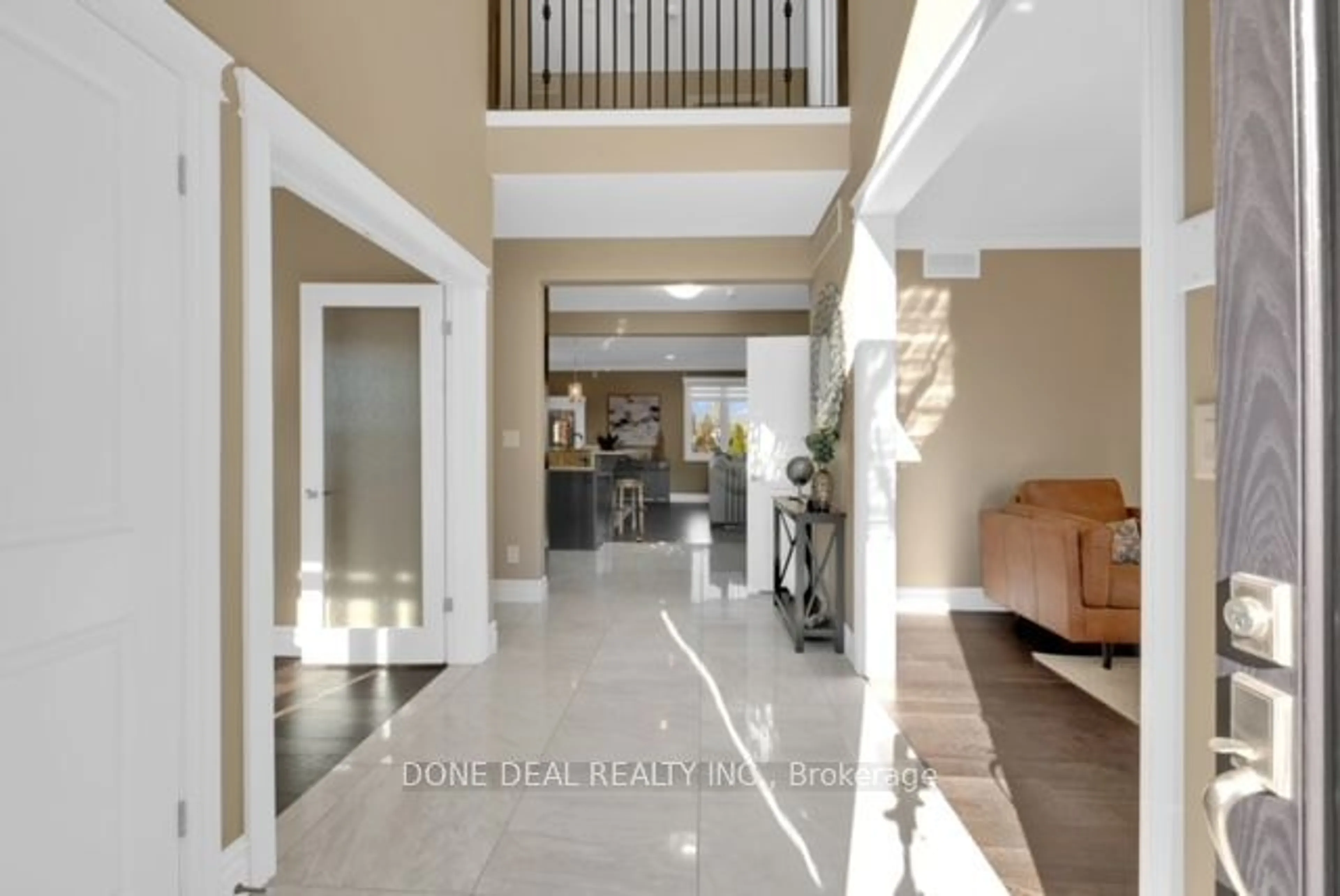 Indoor foyer, wood floors for 1115 Cora Greenwood Dr, Windsor Ontario N8P 1K3