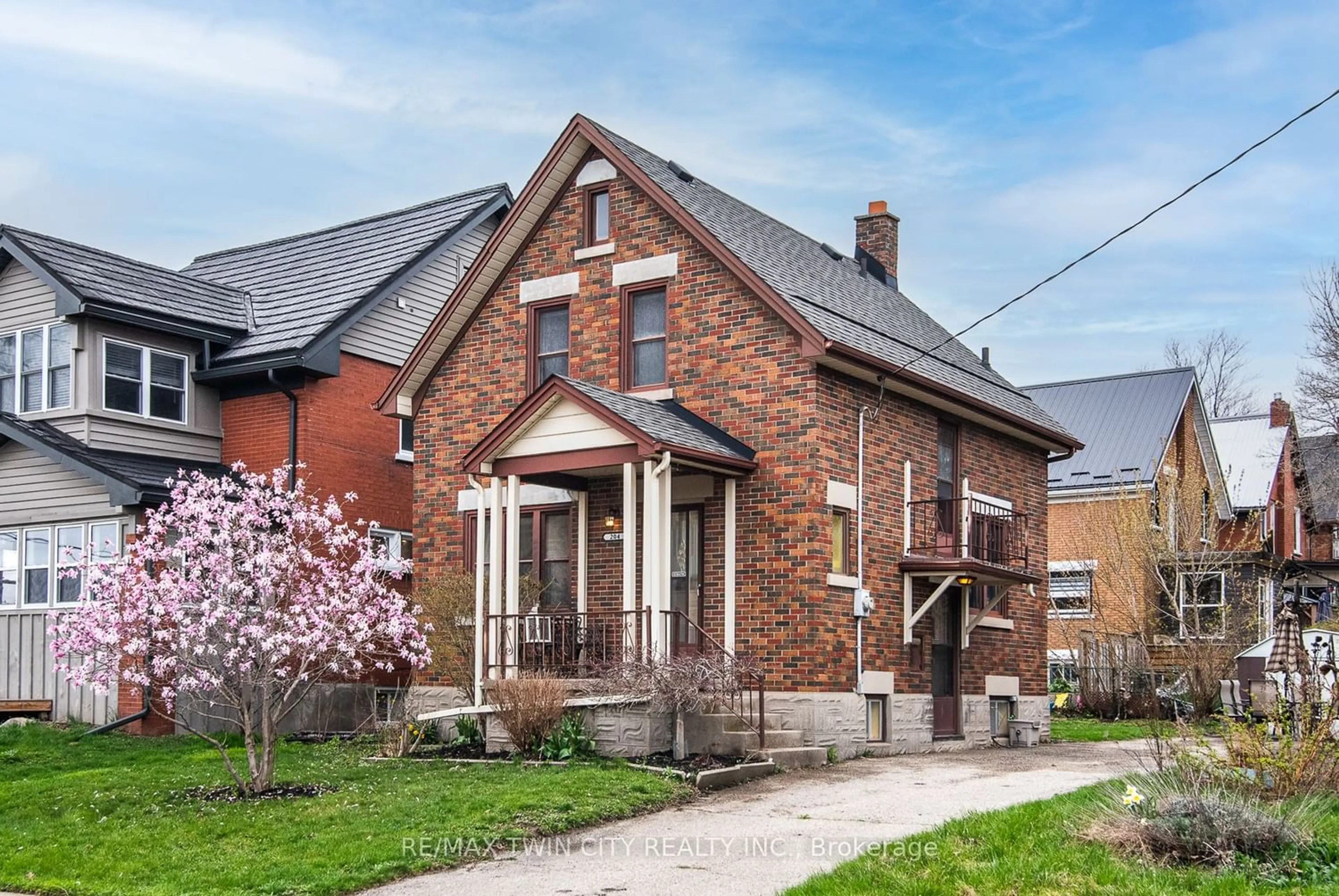 Home with brick exterior material for 204 Kent Ave, Kitchener Ontario N2G 3R4