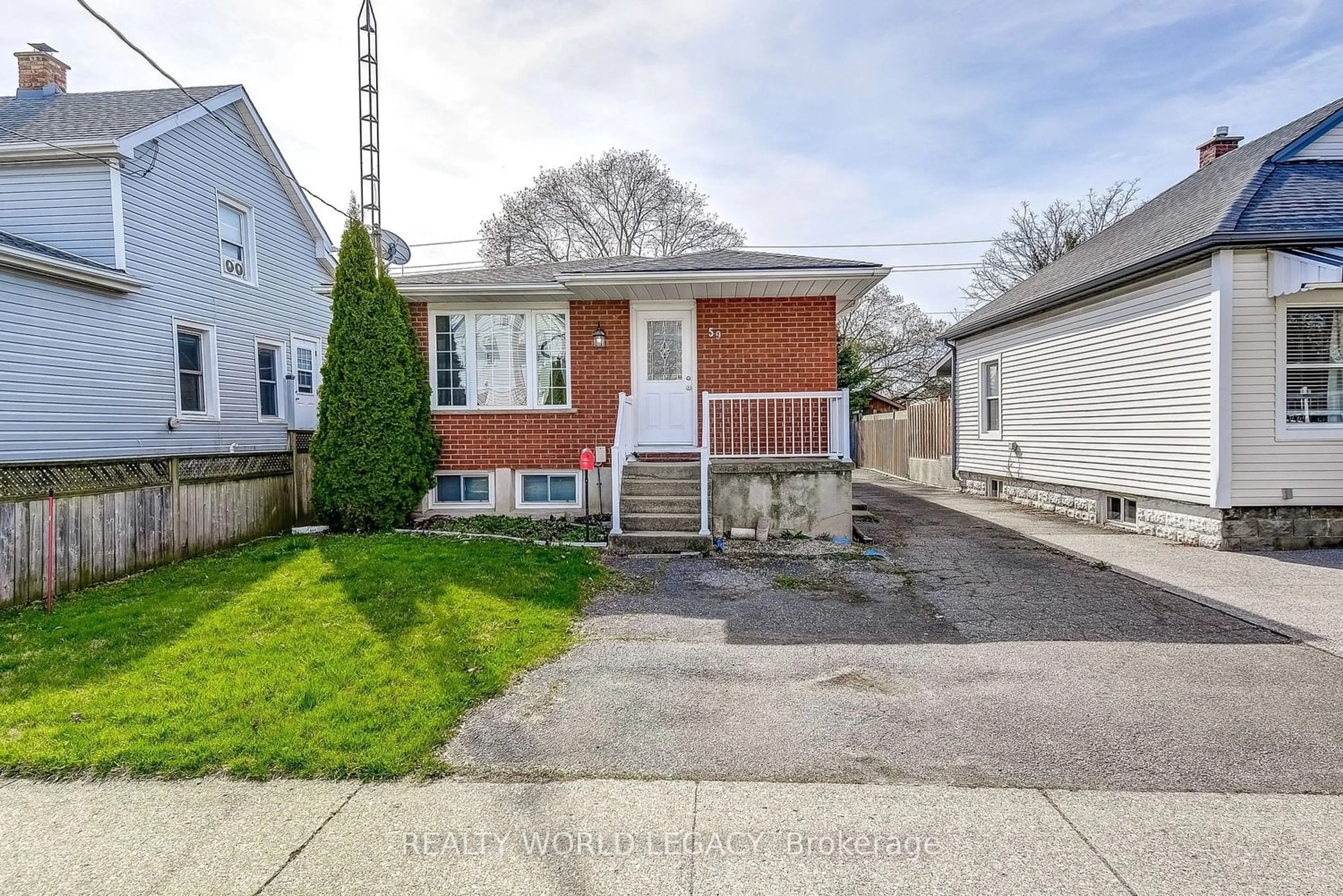 Frontside or backside of a home for 59 Rodman St, St. Catharines Ontario L2R 5C9
