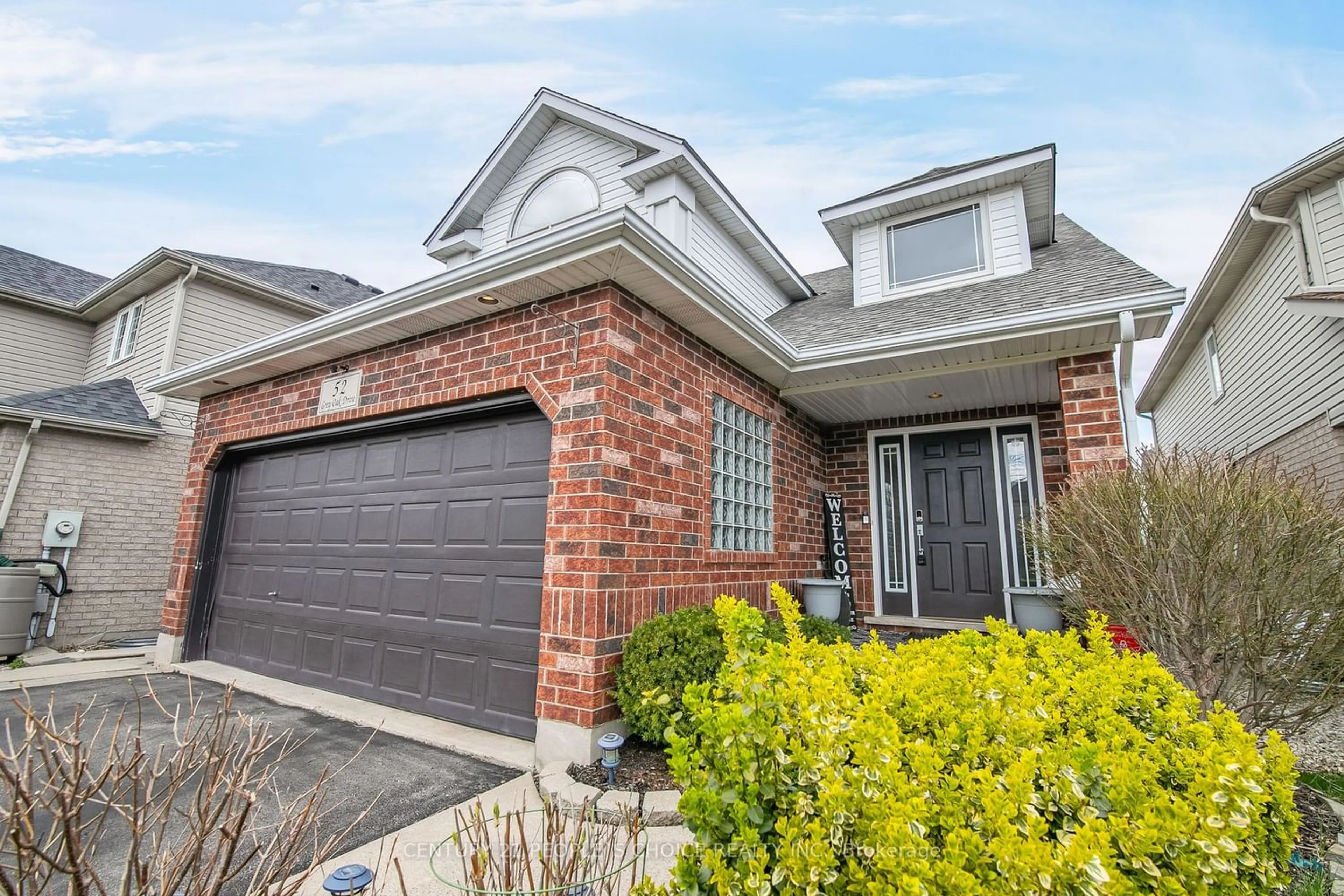 Home with brick exterior material for 52 Grey Oak Dr, Guelph Ontario N1L 1P3