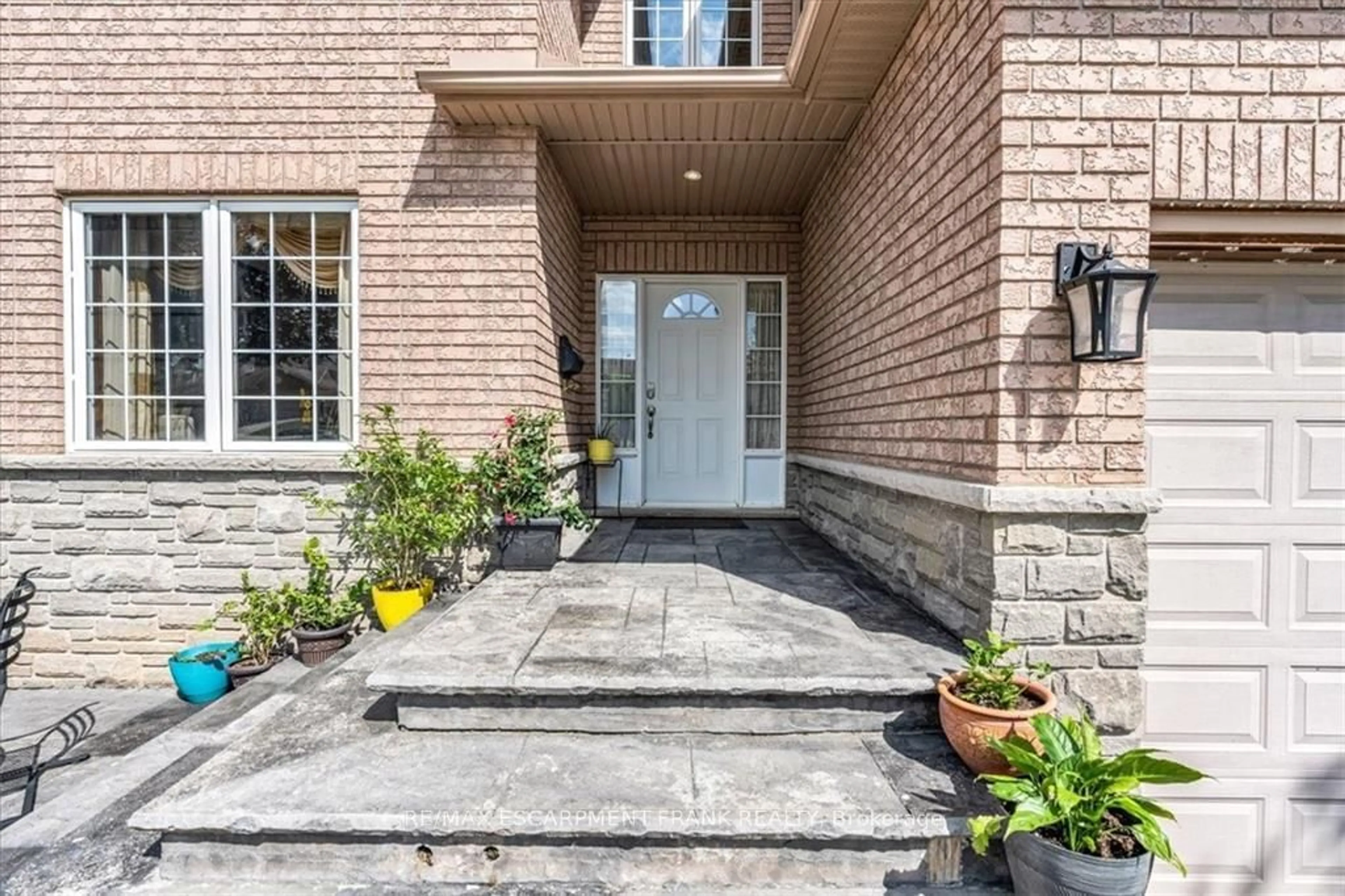 Home with brick exterior material for 18 Blossom Lane, Hamilton Ontario L9C 2W6
