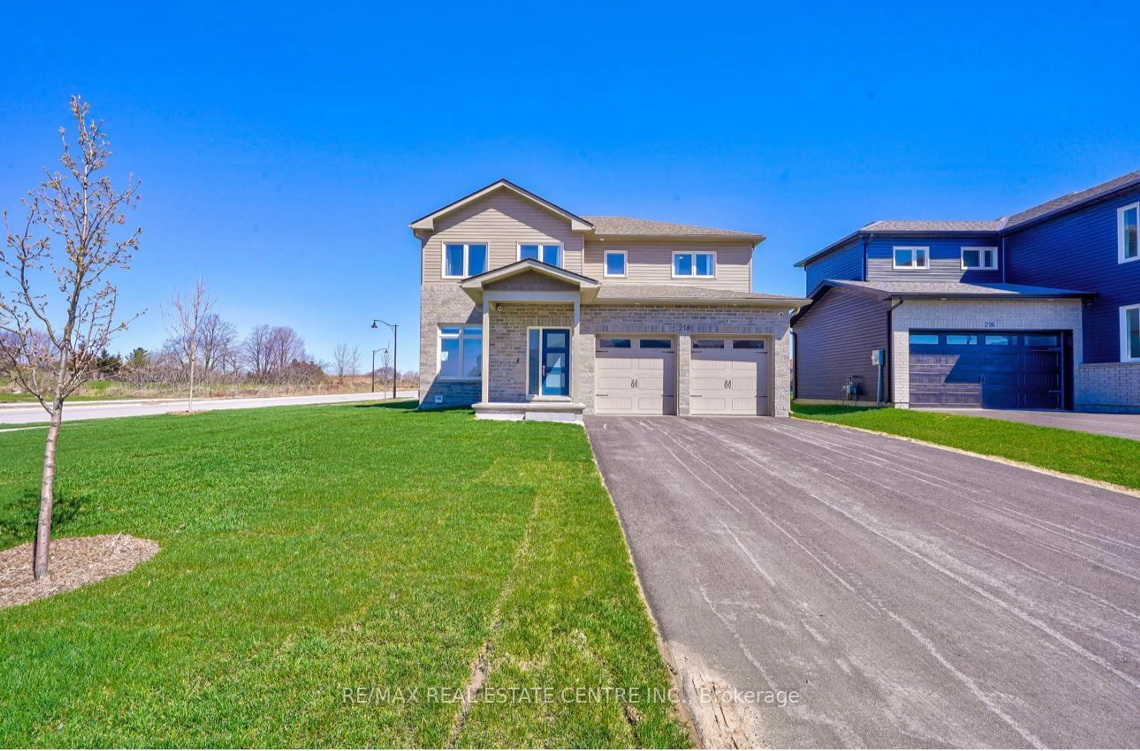 Frontside or backside of a home for 218 Beasley Cres, Prince Edward County Ontario K0K 2T0