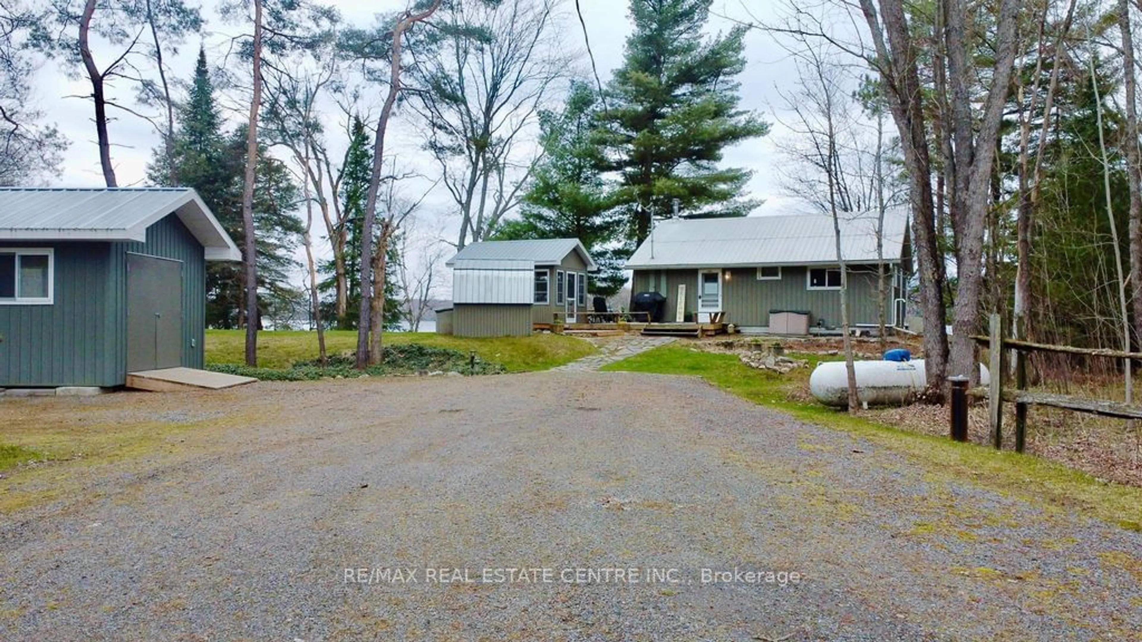 A pic from exterior of the house or condo for 1054 Cove Rd #8, Muskoka Lakes Ontario P0B 1M0