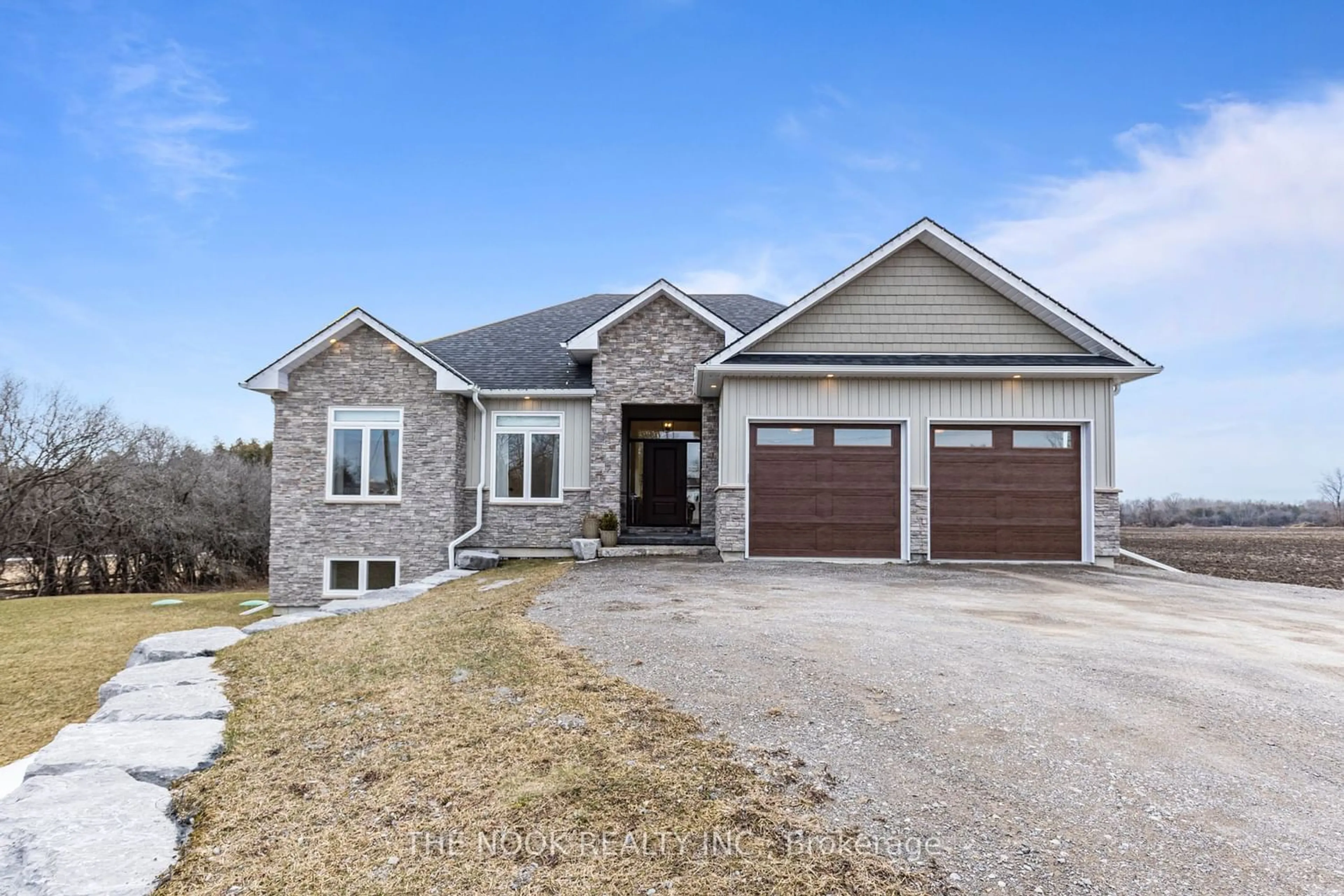 Frontside or backside of a home for 418 Golf Course Rd, Kawartha Lakes Ontario L0B 1K0