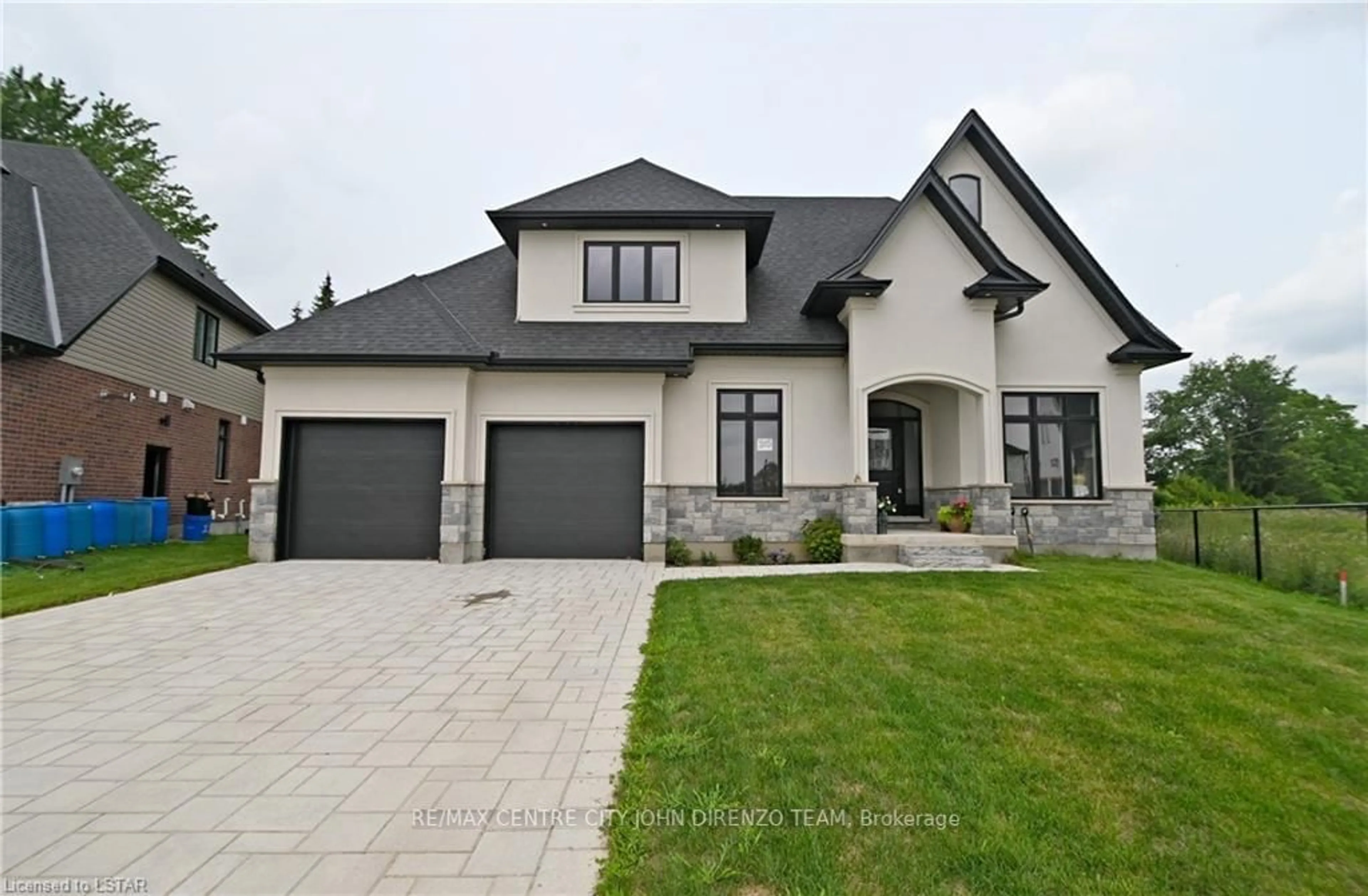 Frontside or backside of a home for 105 Aspen Circ, Thames Centre Ontario N0M 2P0