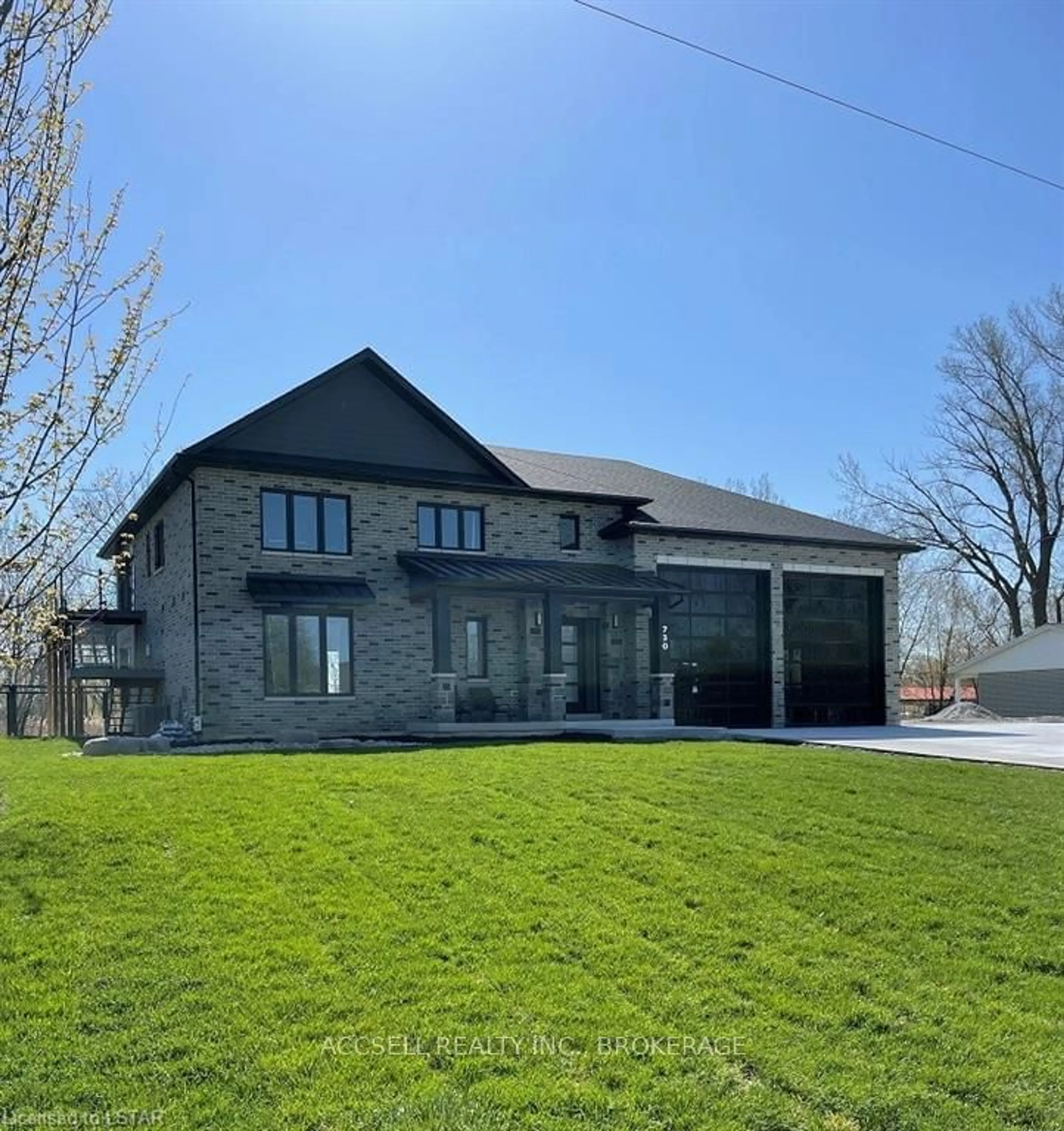 A pic from outside/outdoor area/front of a property/back of a property/a pic from drone, building for 730 RIVAIT Dr, Lakeshore Ontario N0P 2L0