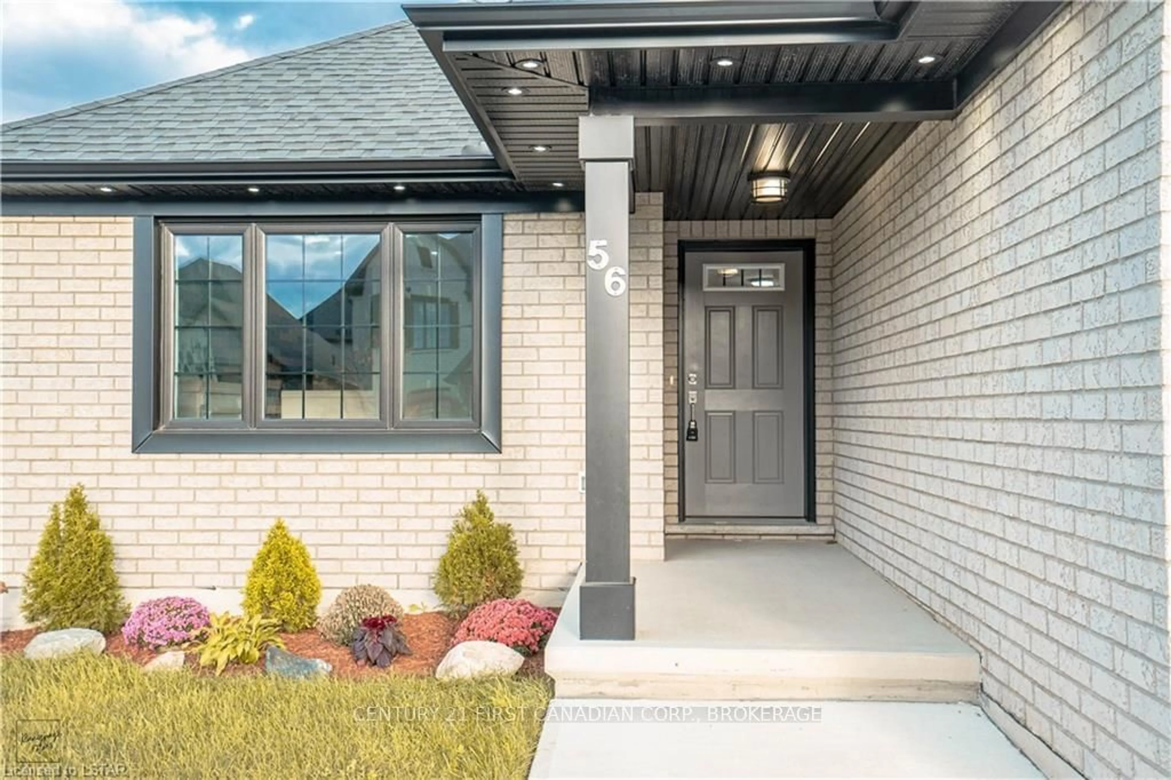 Home with brick exterior material for 56 Honey Bend, St. Thomas Ontario N5R 0H6
