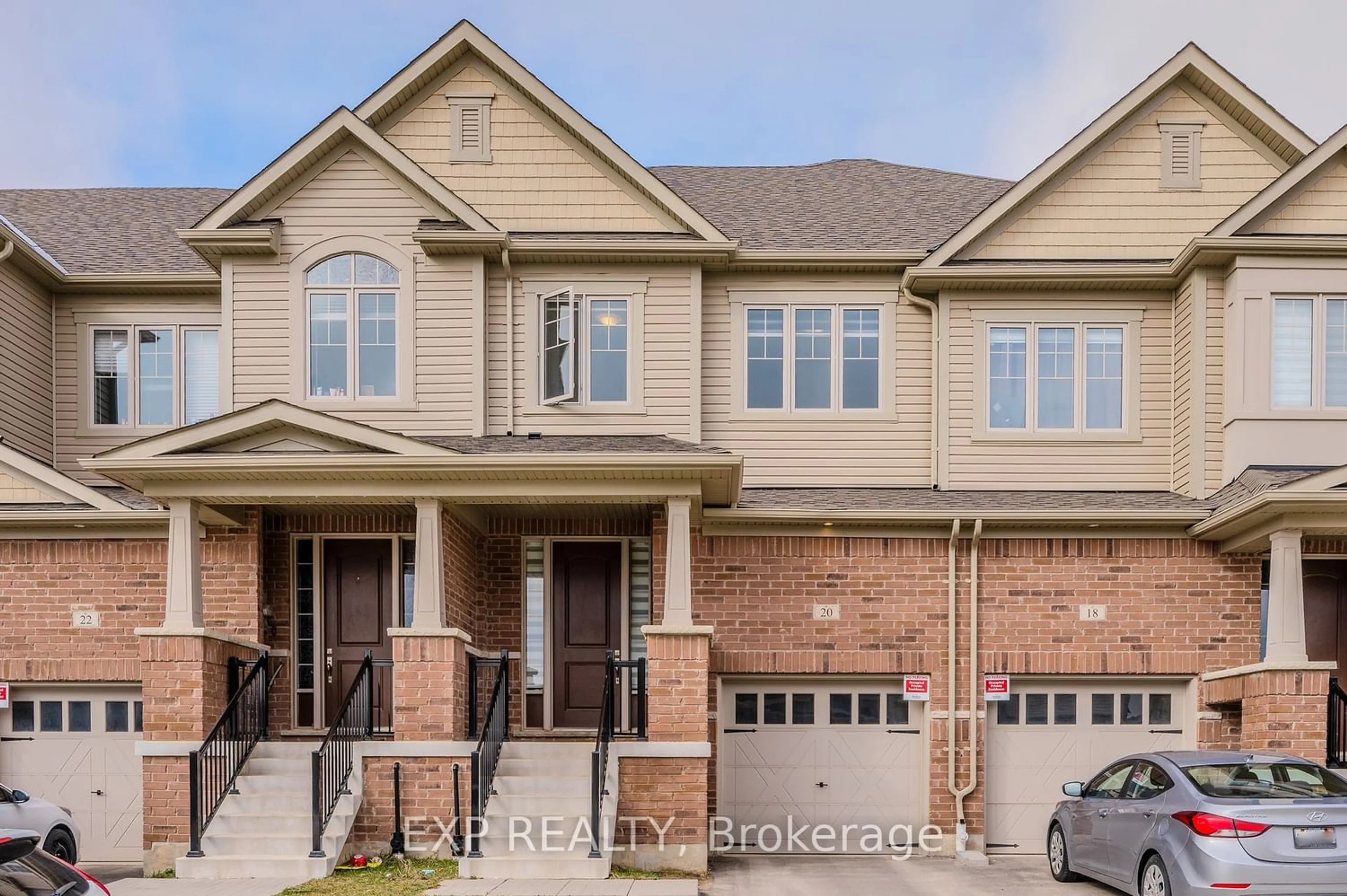 Home with brick exterior material for 20 Grassbourne Ave, Kitchener Ontario N0B 2E0