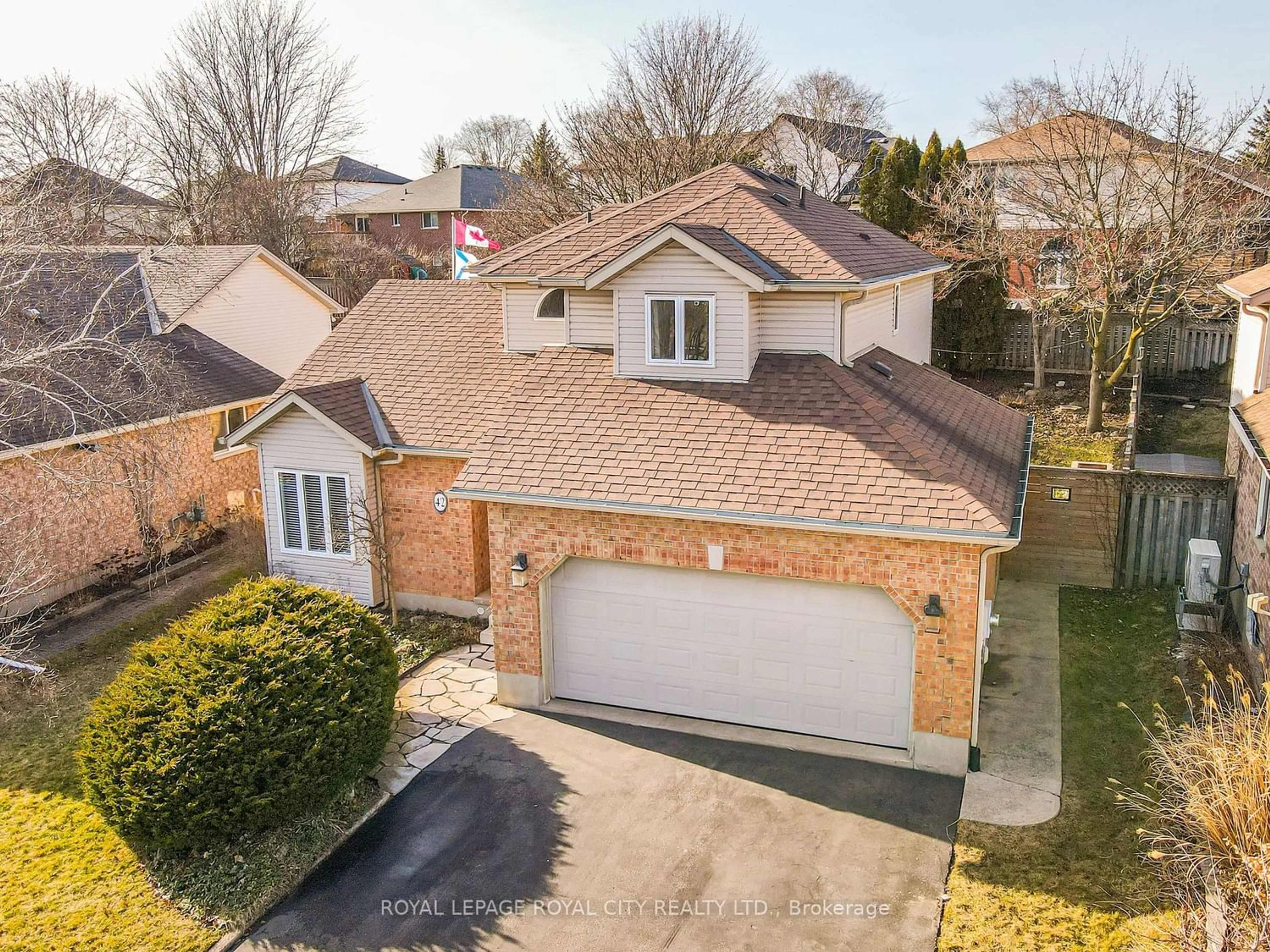 Frontside or backside of a home for 42 Peartree Cres, Guelph Ontario N1H 8J2