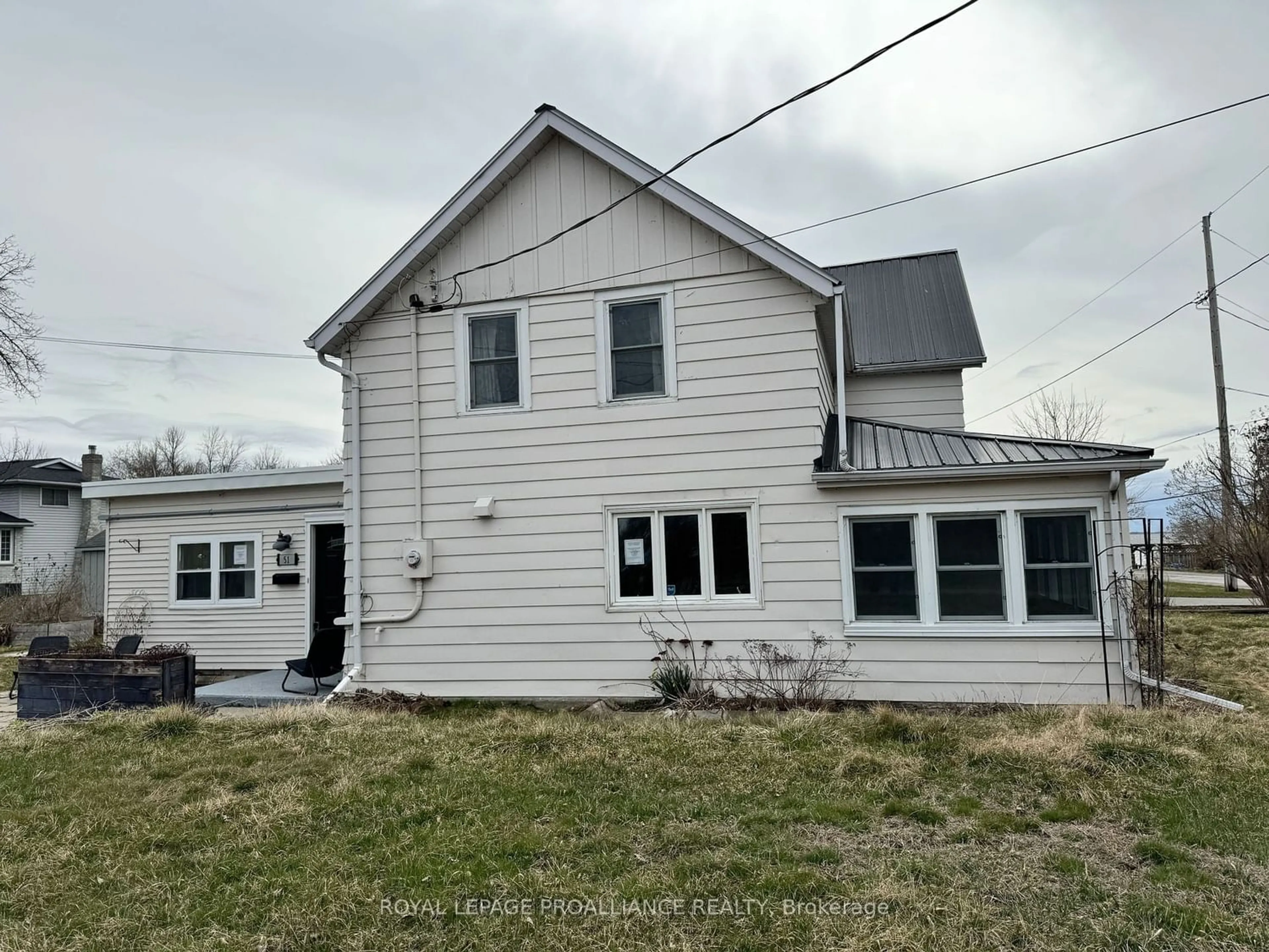 Frontside or backside of a home for 51 Reddick St, Prince Edward County Ontario K8N 0L5