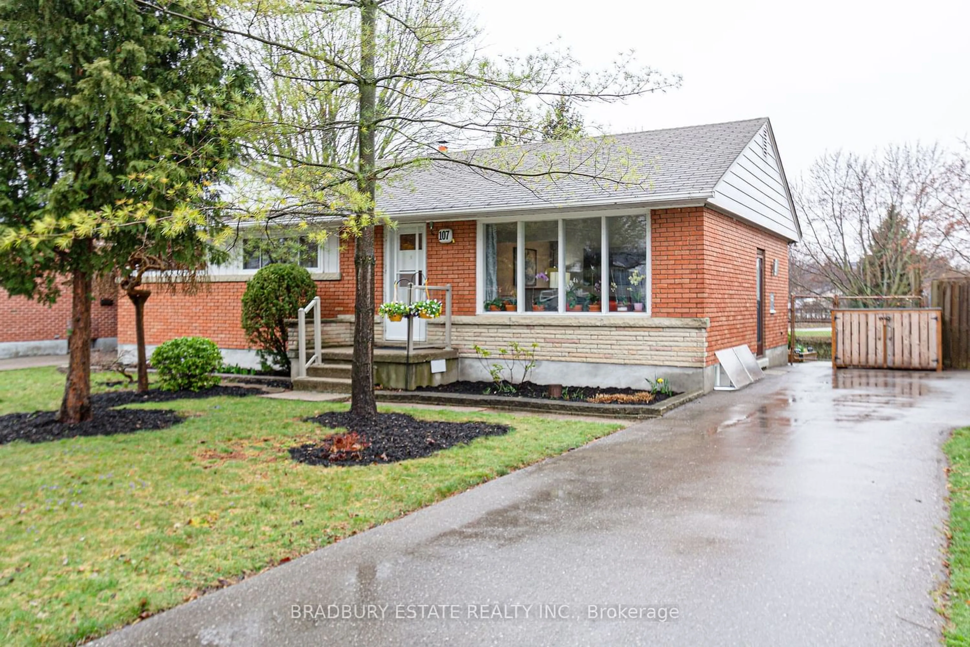Home with brick exterior material for 107 Clark Ave, Kitchener Ontario N2C 1Y1