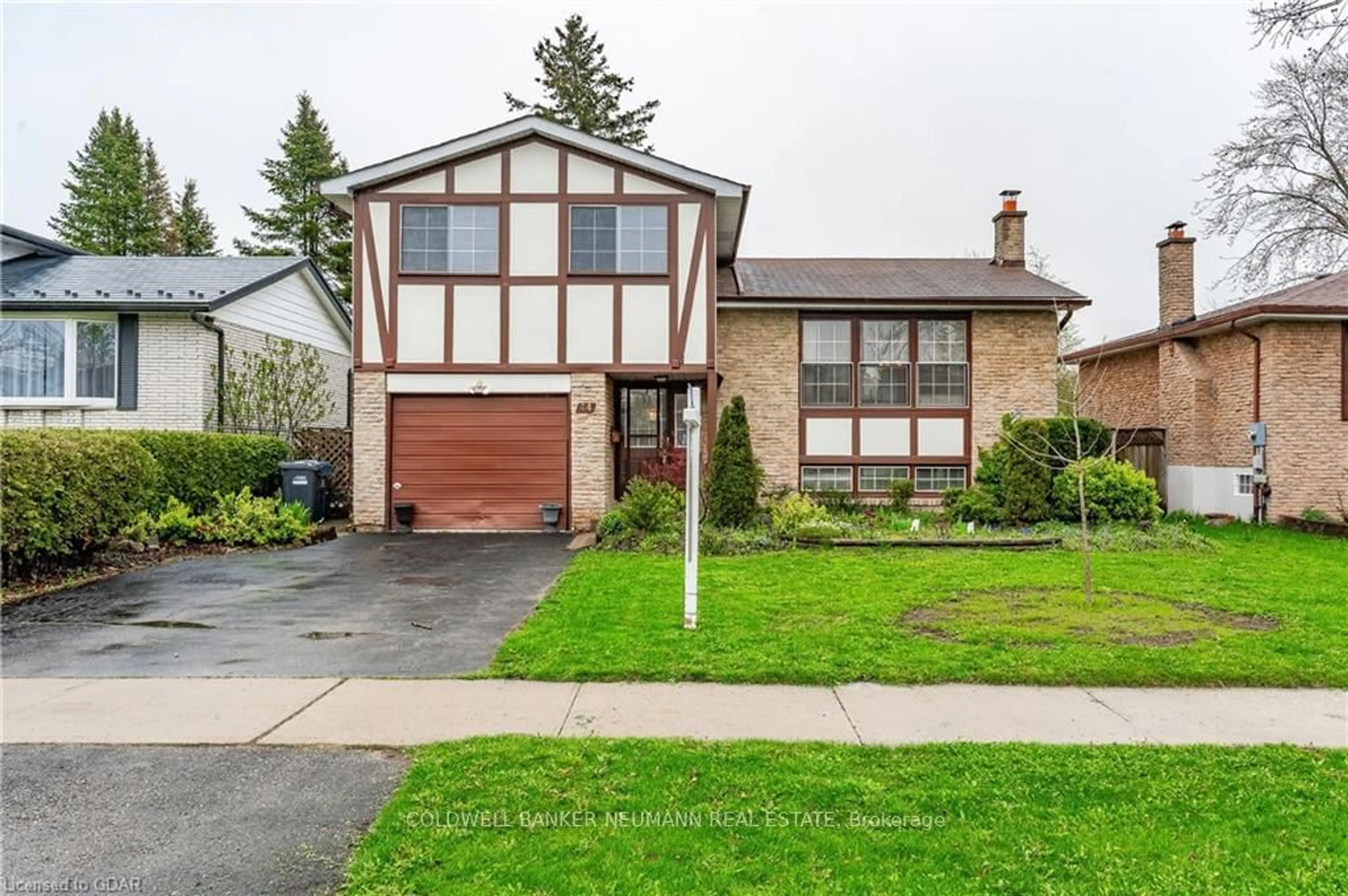 Frontside or backside of a home for 44 Queensdale Cres, Guelph Ontario N1H 6W3