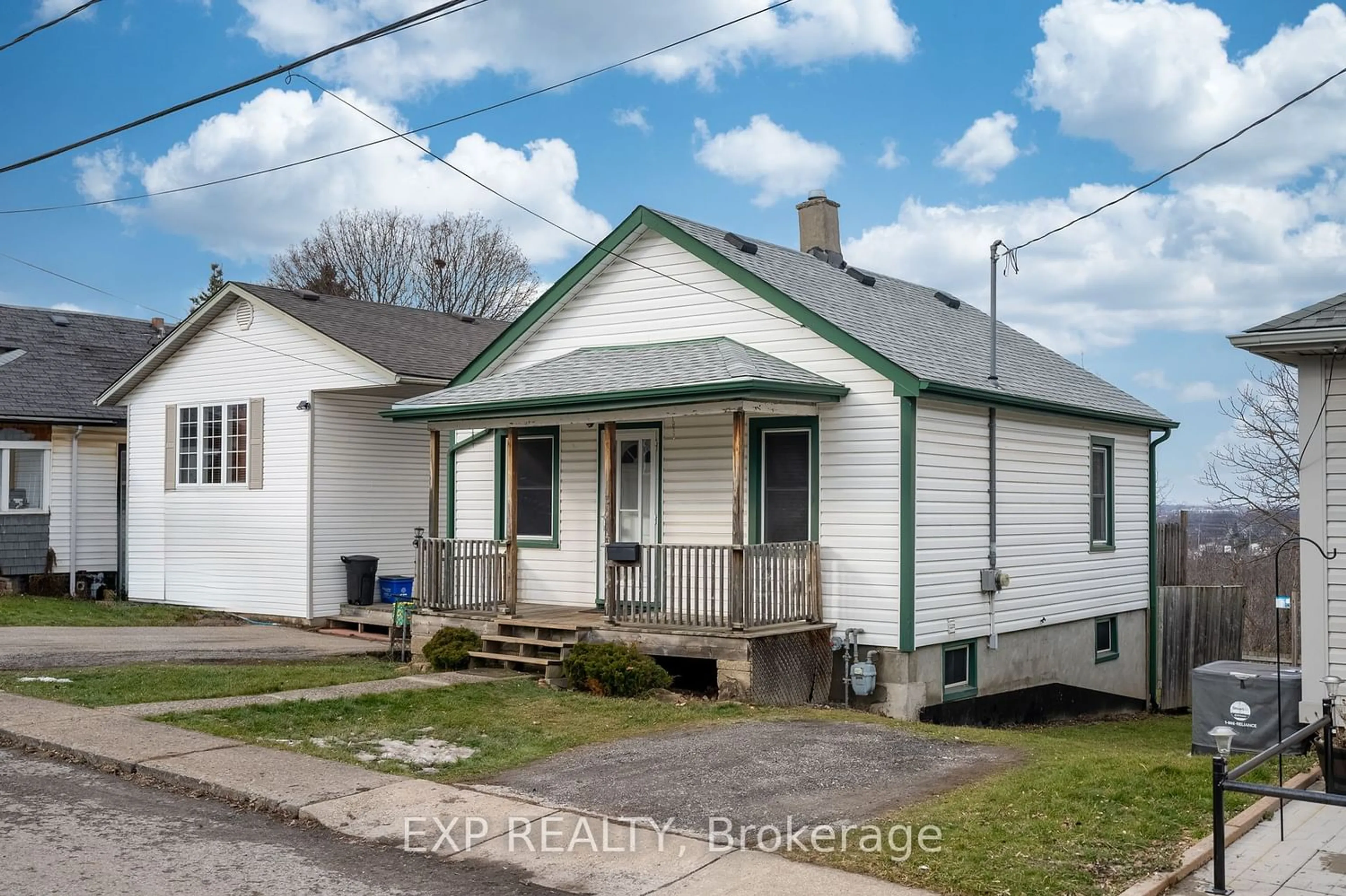Frontside or backside of a home for 15 Ball Ave, St. Catharines Ontario L2T 1B4
