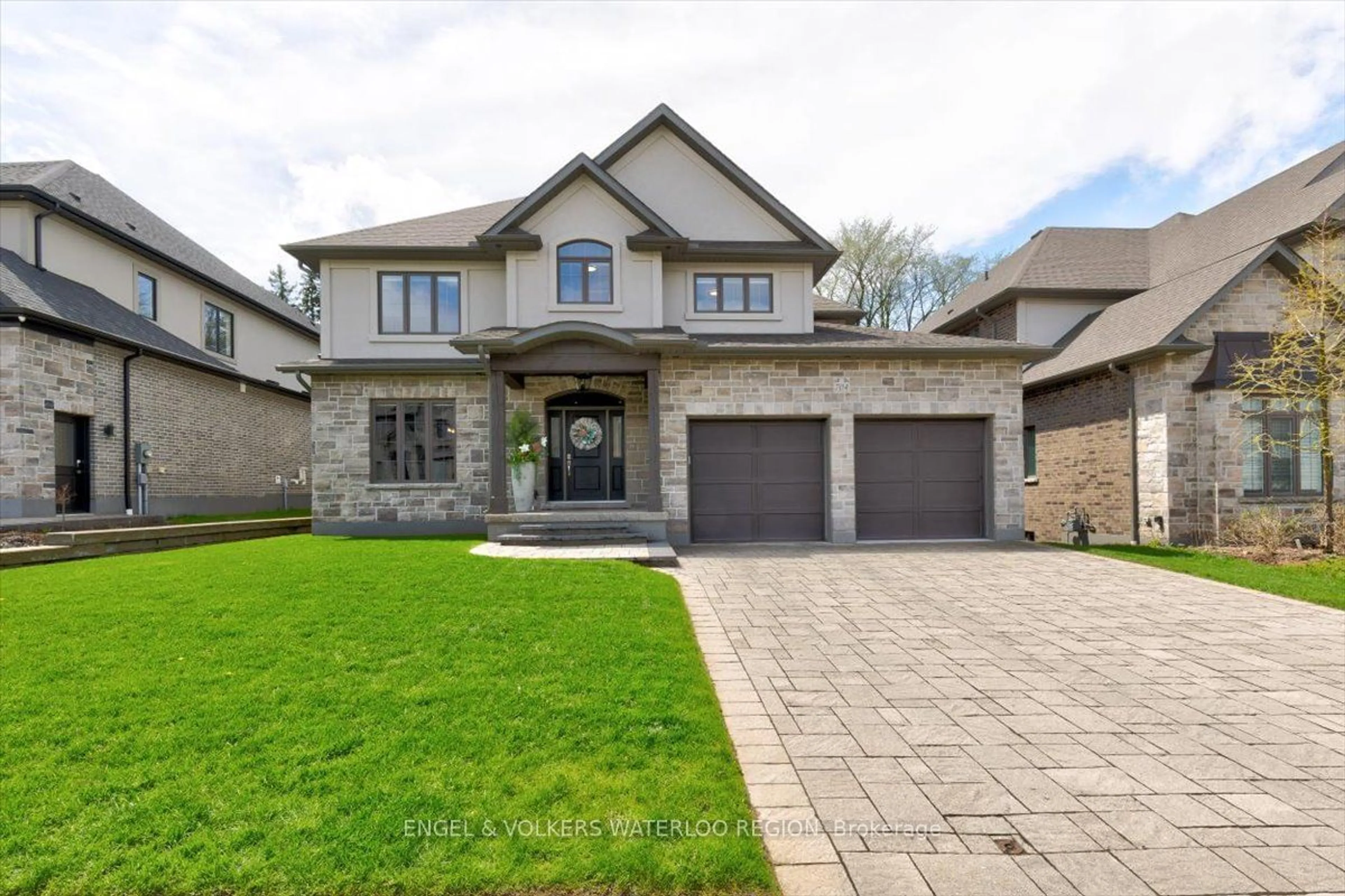 Home with brick exterior material for 704 Meadowsweet Ave, Waterloo Ontario N2V 0A6