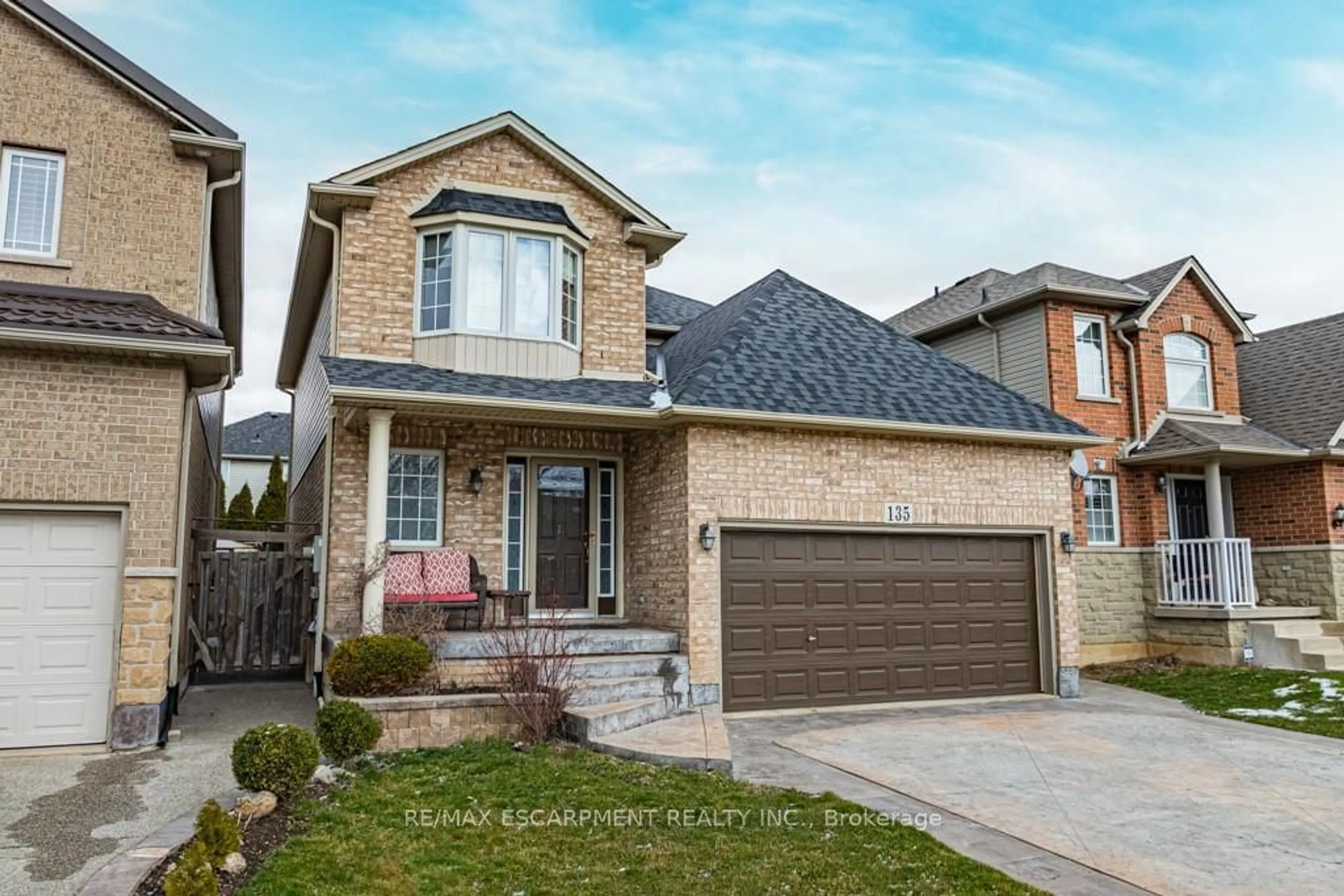 Frontside or backside of a home for 135 Theodore Dr, Hamilton Ontario L9A 5K1