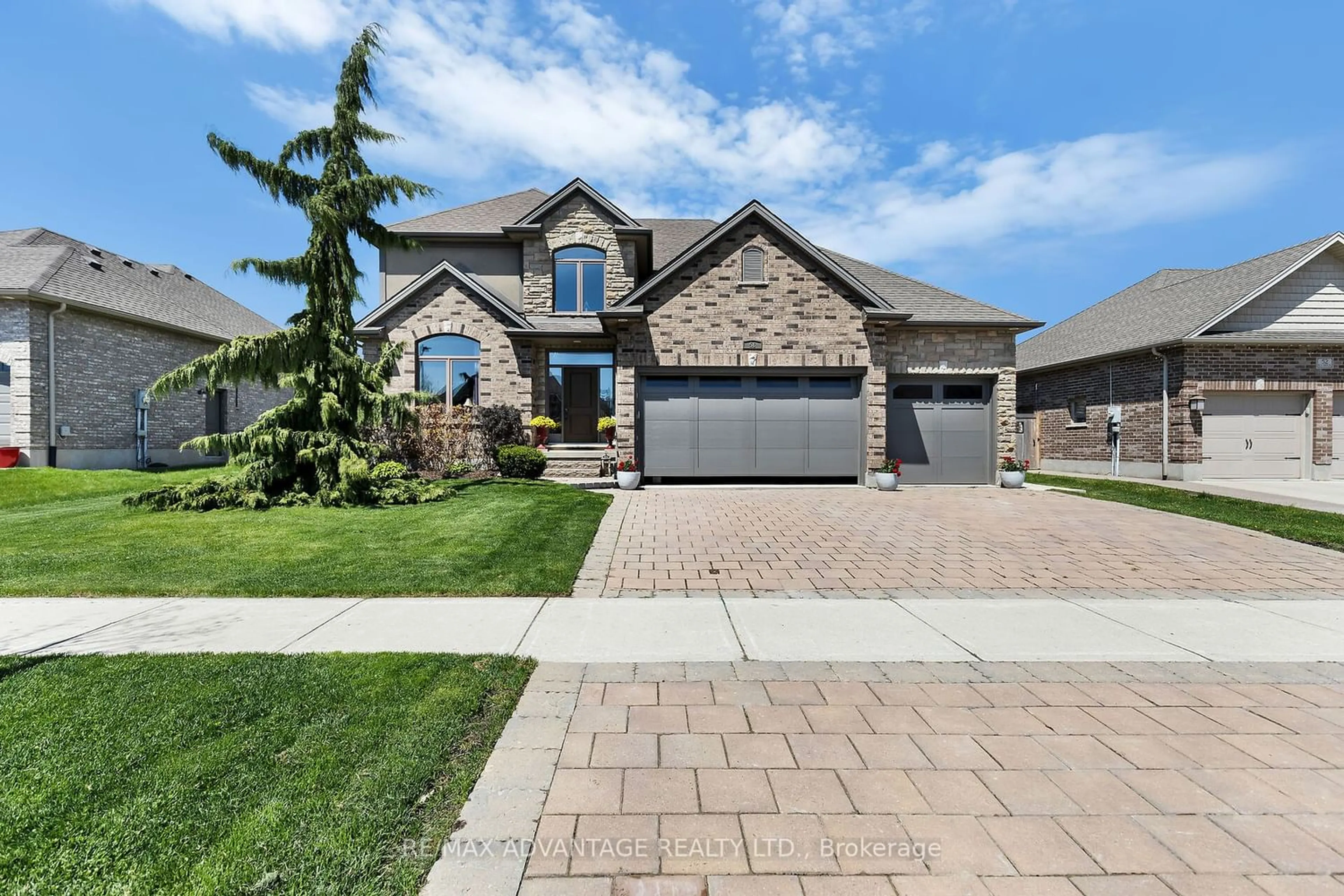 Frontside or backside of a home for 56 Blue Heron Dr, Middlesex Centre Ontario N0M 2A0