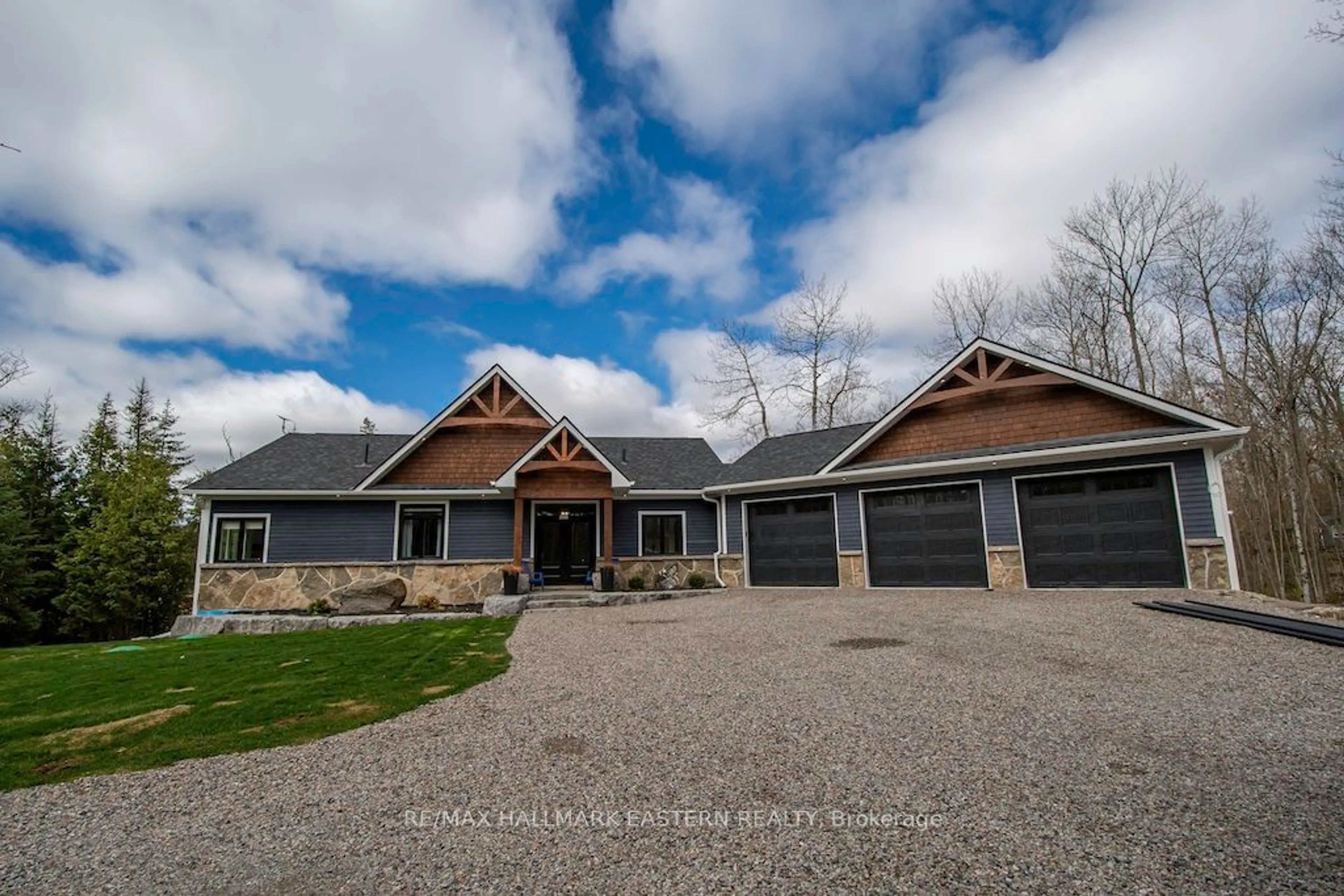 Frontside or backside of a home for 115 Hall Dr, Galway-Cavendish and Harvey Ontario K0L 1J0
