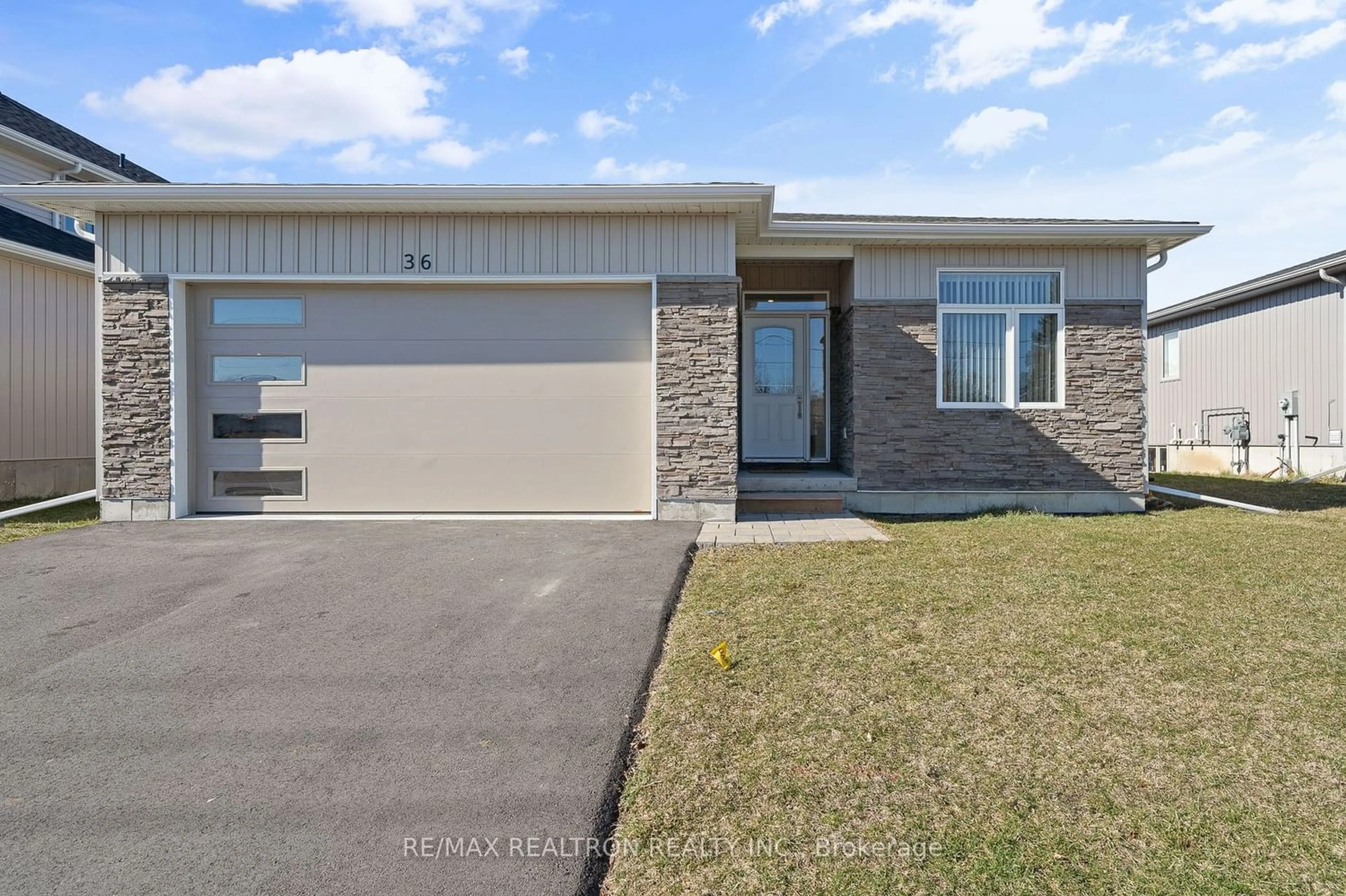 Frontside or backside of a home for 36 Mcfarland Dr, Belleville Ontario K8N 2X2