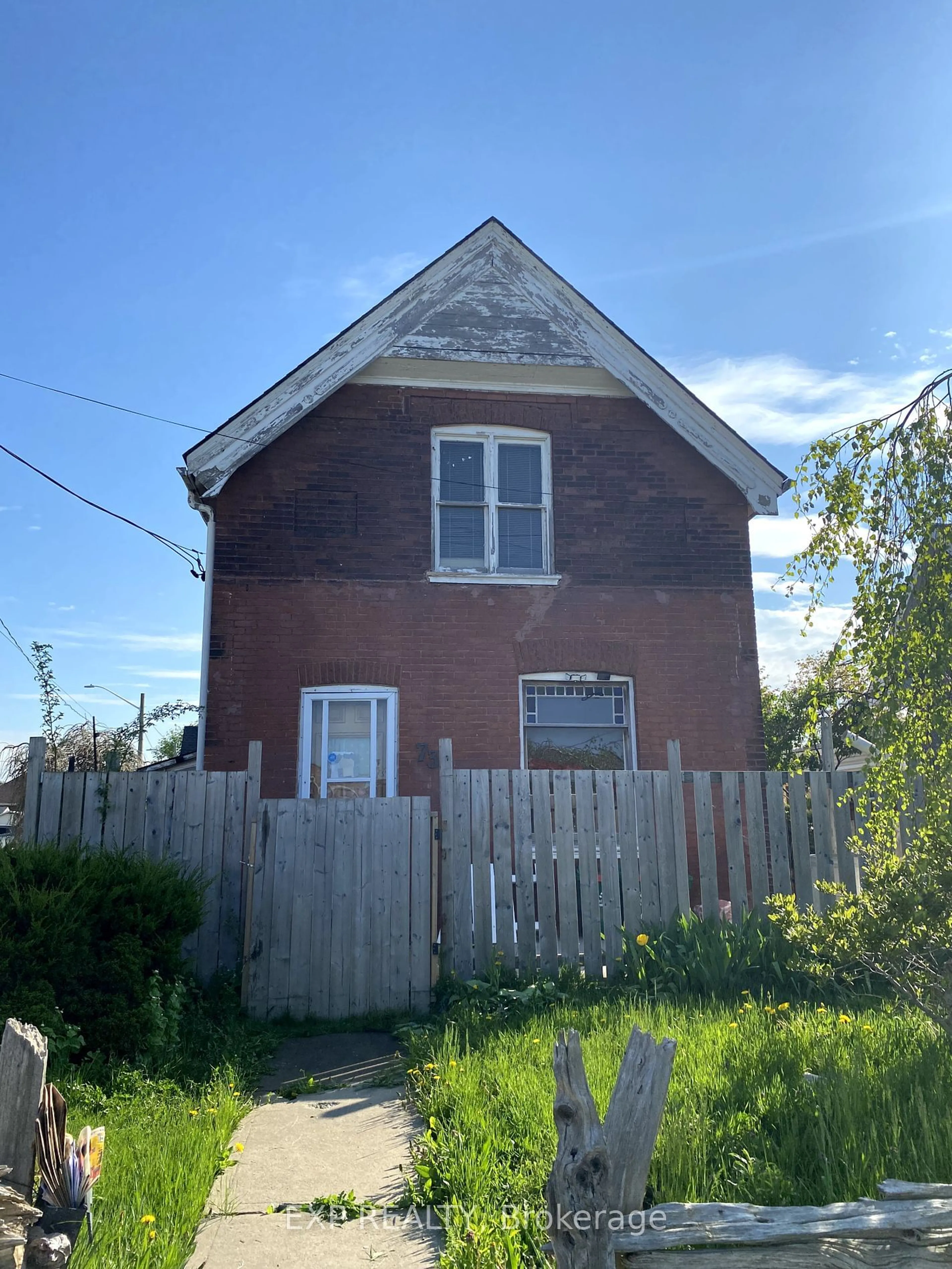 Frontside or backside of a home for 73 Mohawk St, Brantford Ontario N3S 2W5