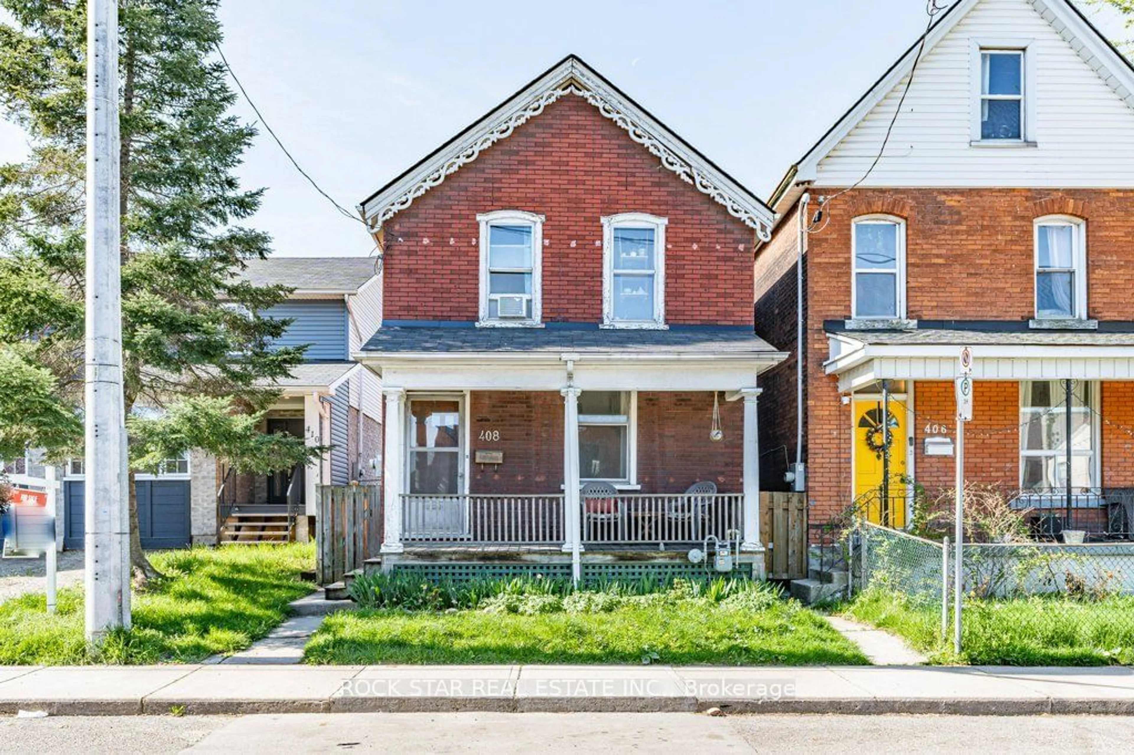 Frontside or backside of a home for 408 King William St, Hamilton Ontario L8L 1P7