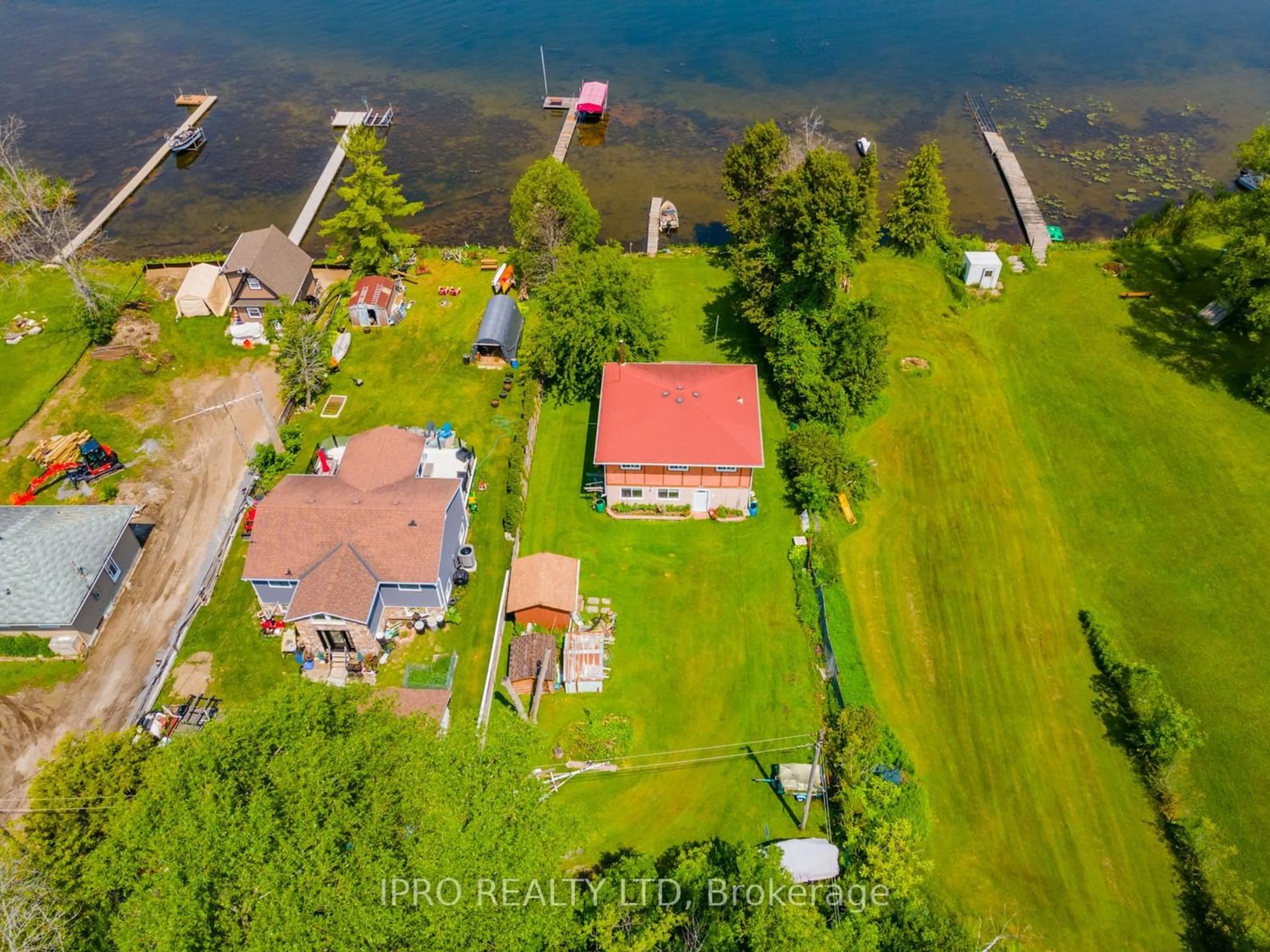 A pic from outside/outdoor area/front of a property/back of a property/a pic from drone, water/lake/river/ocean view for 5538 Rice Lake Scenic Dr, Hamilton Township Ontario K0K 2E0