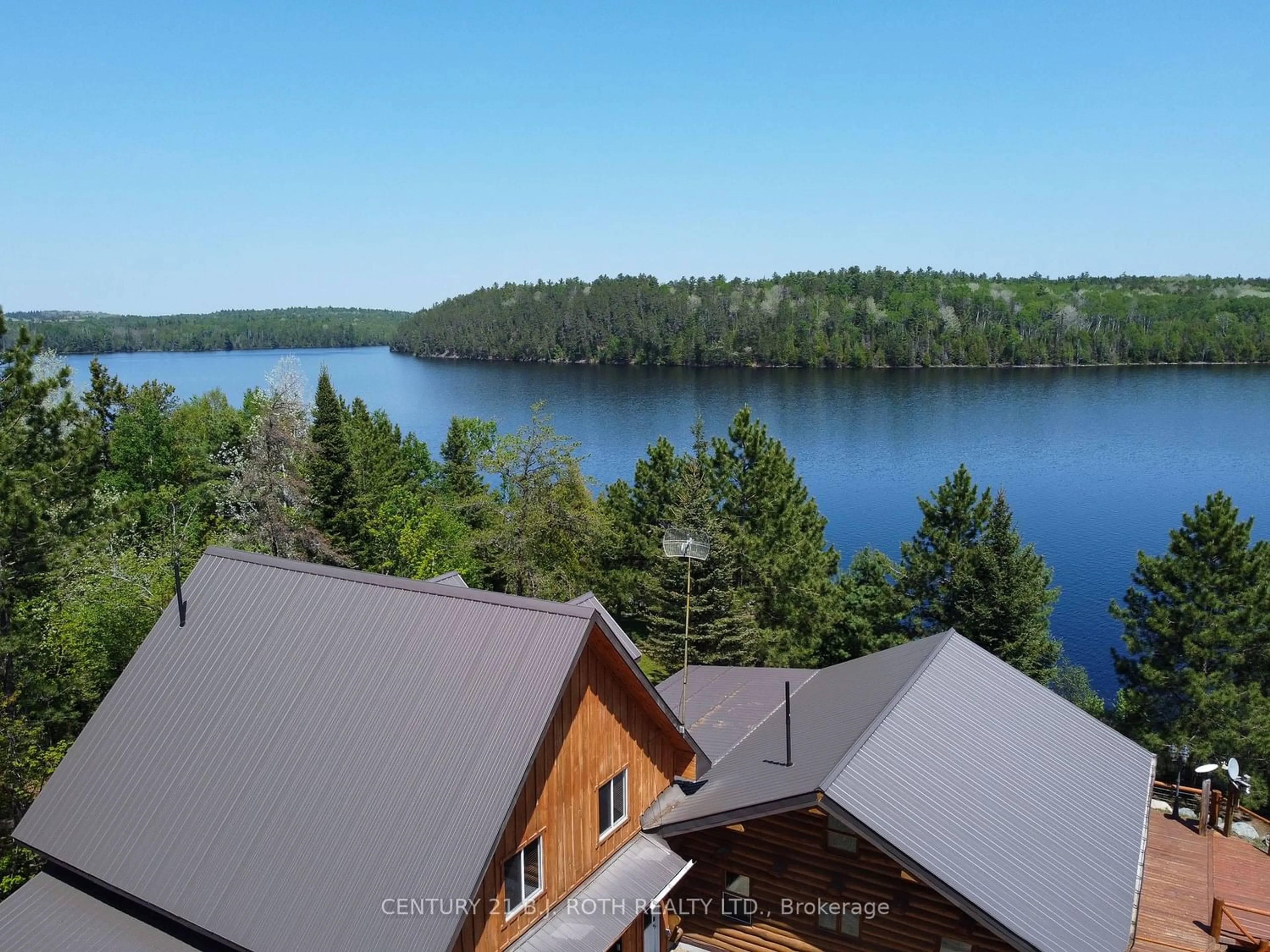 A pic from exterior of the house or condo, lake for 59 White Bear Crt, Temagami Ontario P0H 2H0