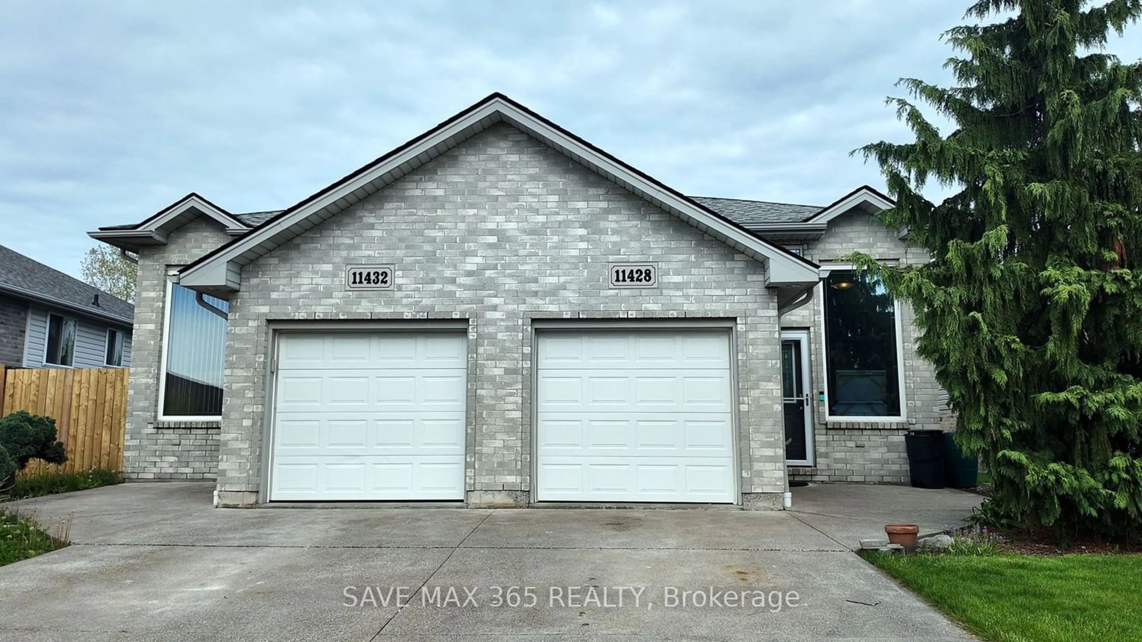 Frontside or backside of a home for 11428 Timber Bay Cres, Windsor Ontario N8R 2K9