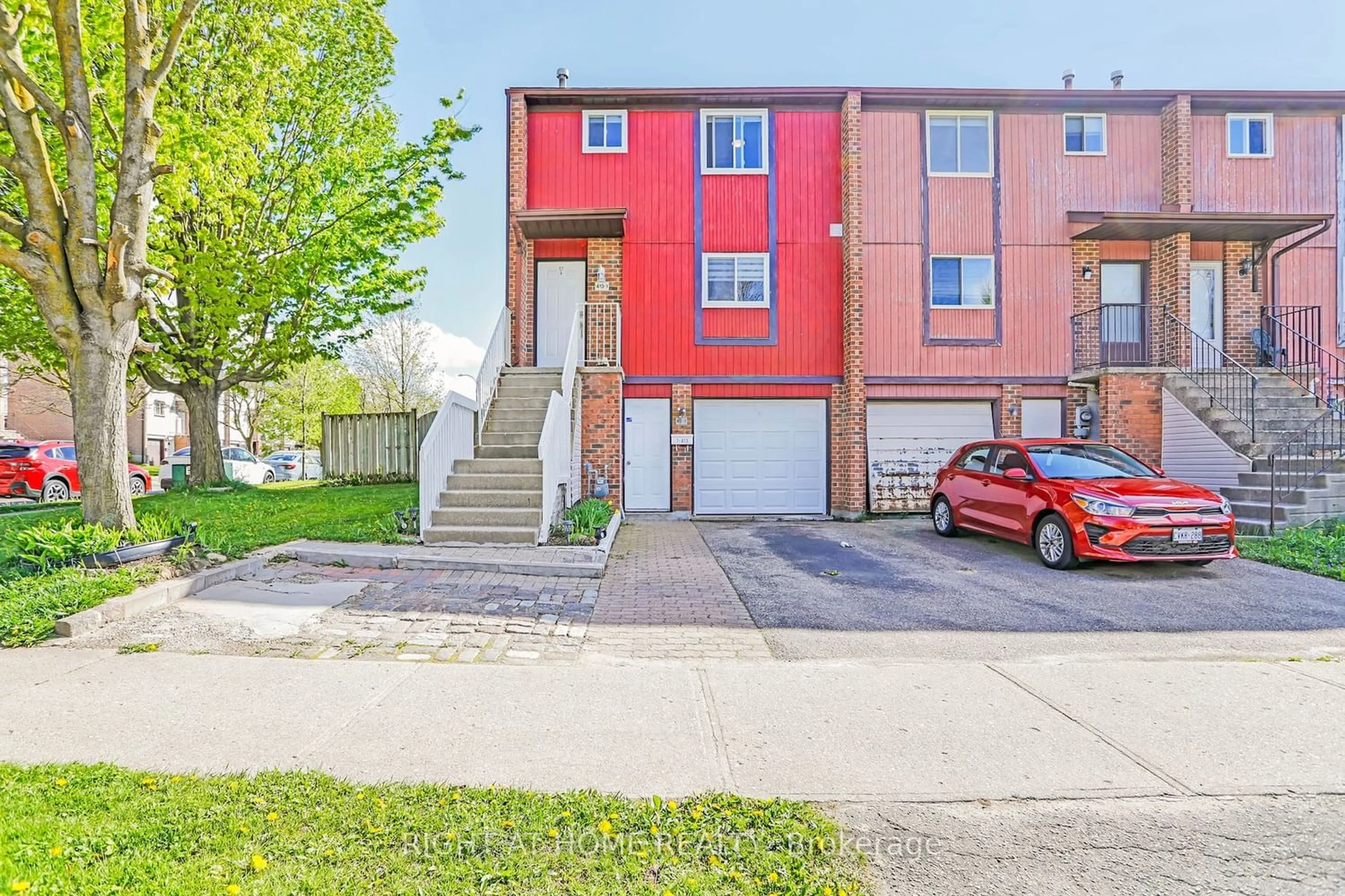 A pic from exterior of the house or condo for 413 Bairstow Cres #1, Kitchener Ontario N2K 2H7