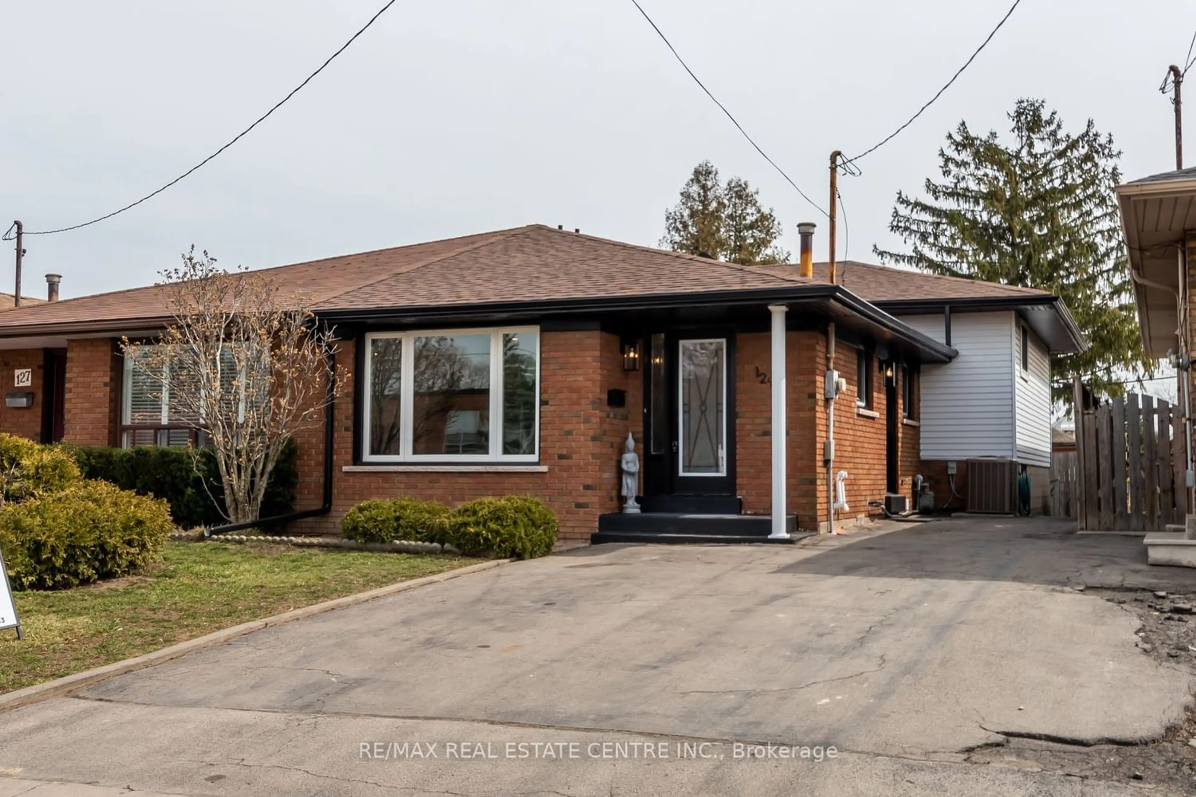 Frontside or backside of a home for 129 Parkdale Ave, Hamilton Ontario L8K 6K4