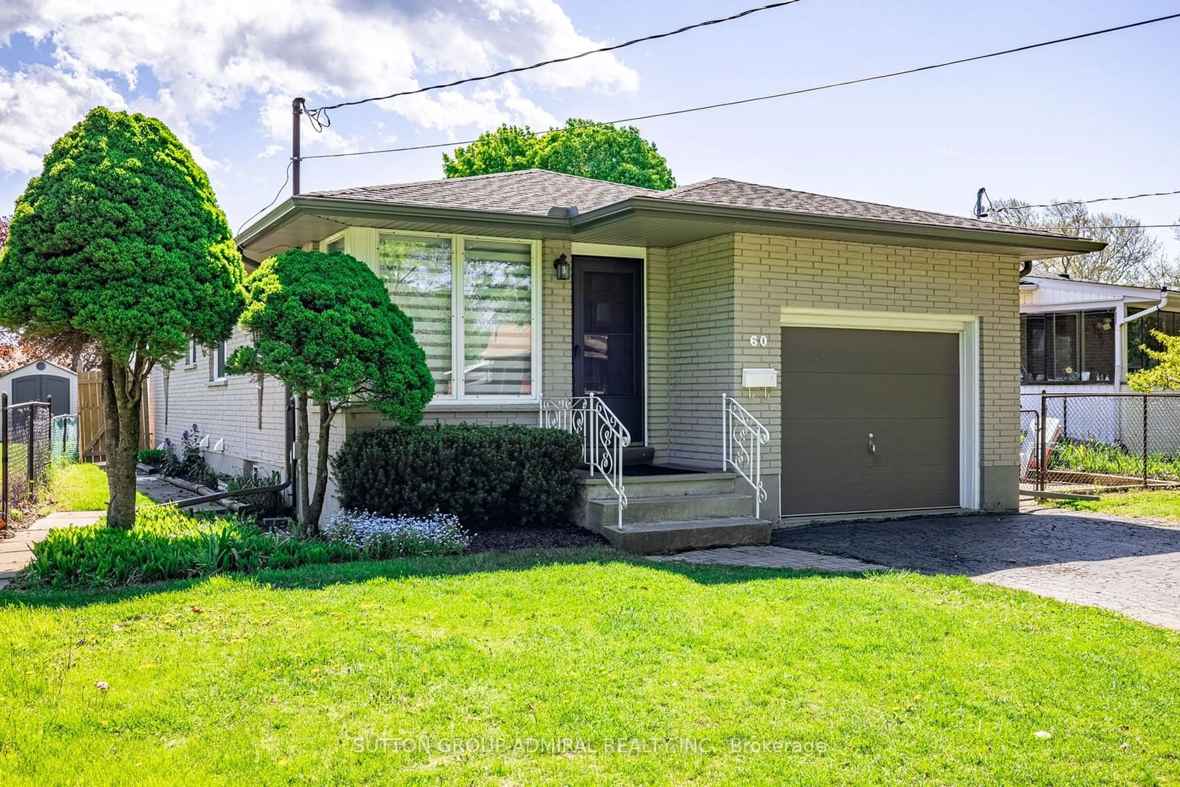 Frontside or backside of a home for 60 Pearce Ave, St. Catharines Ontario L2M 6N4