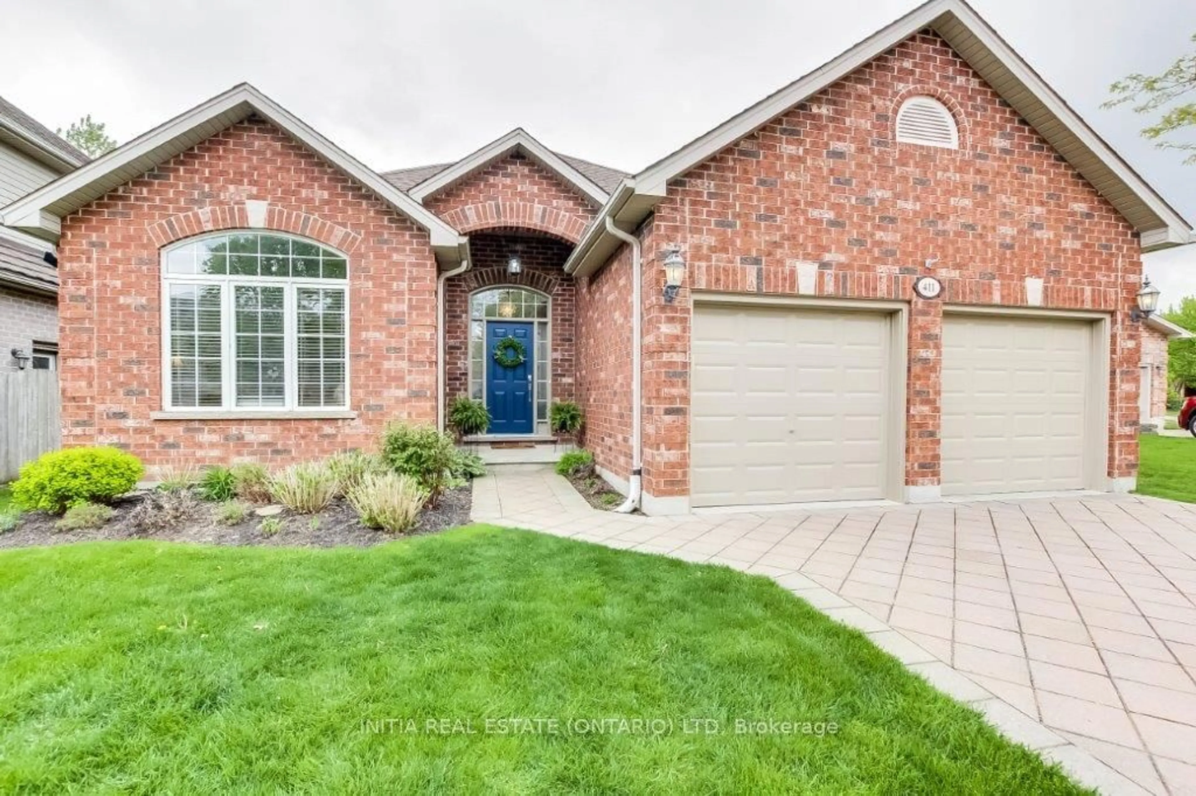 Home with brick exterior material for 411 Kingbird Crt, London Ontario N5X 4H6