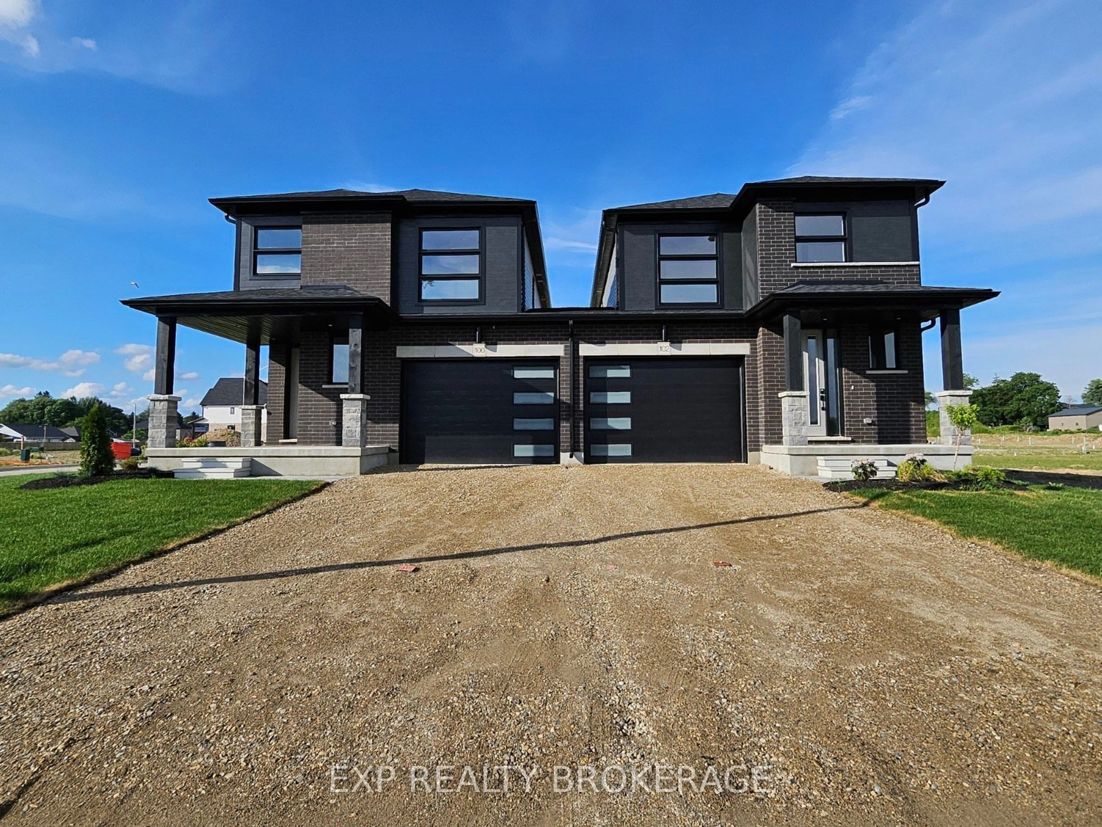 Frontside or backside of a home, the street view for 102 Thackeray Way, Minto Ontario N0G 1Z0