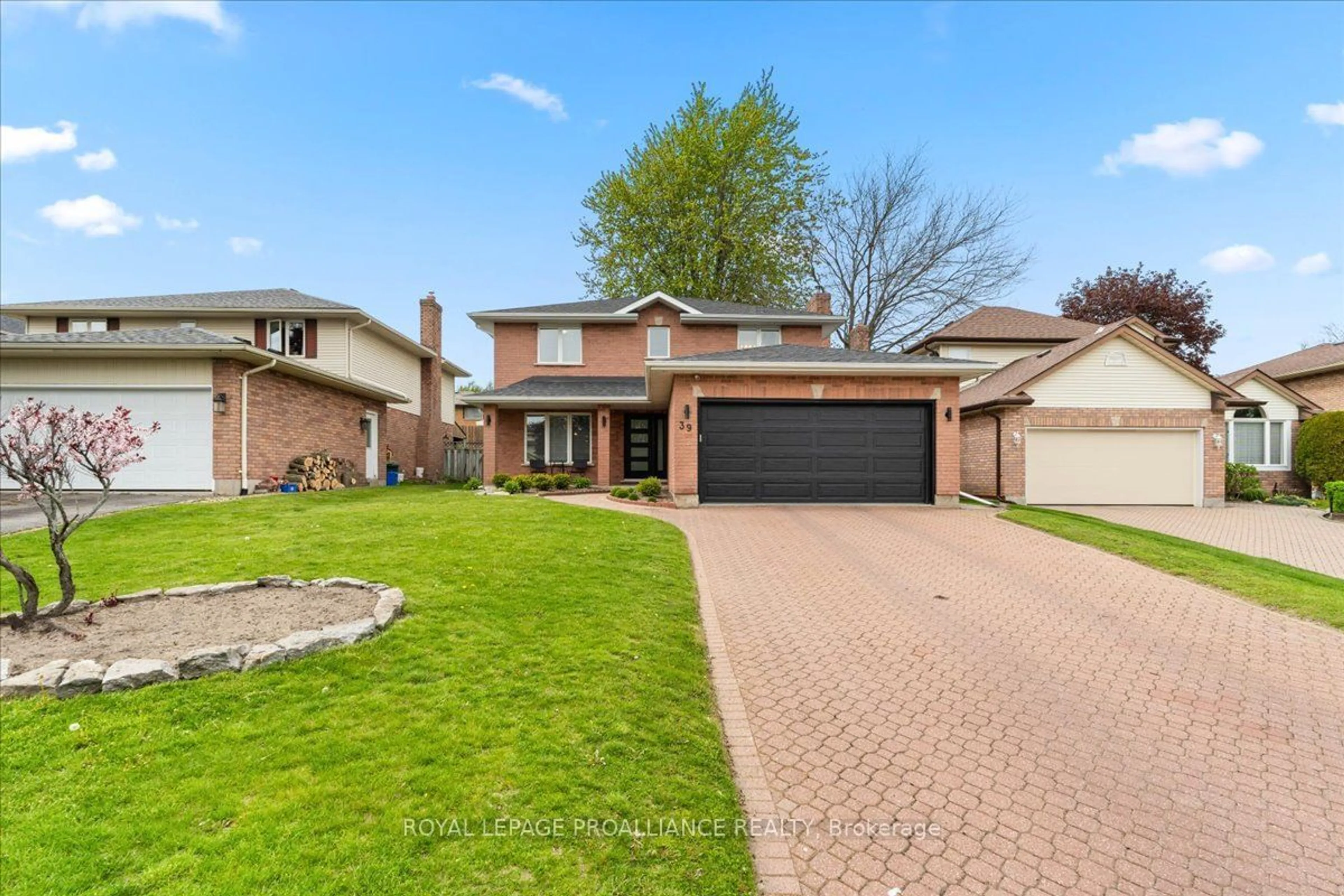 Home with brick exterior material for 39 Northumberland Blvd, Quinte West Ontario K8V 6L7