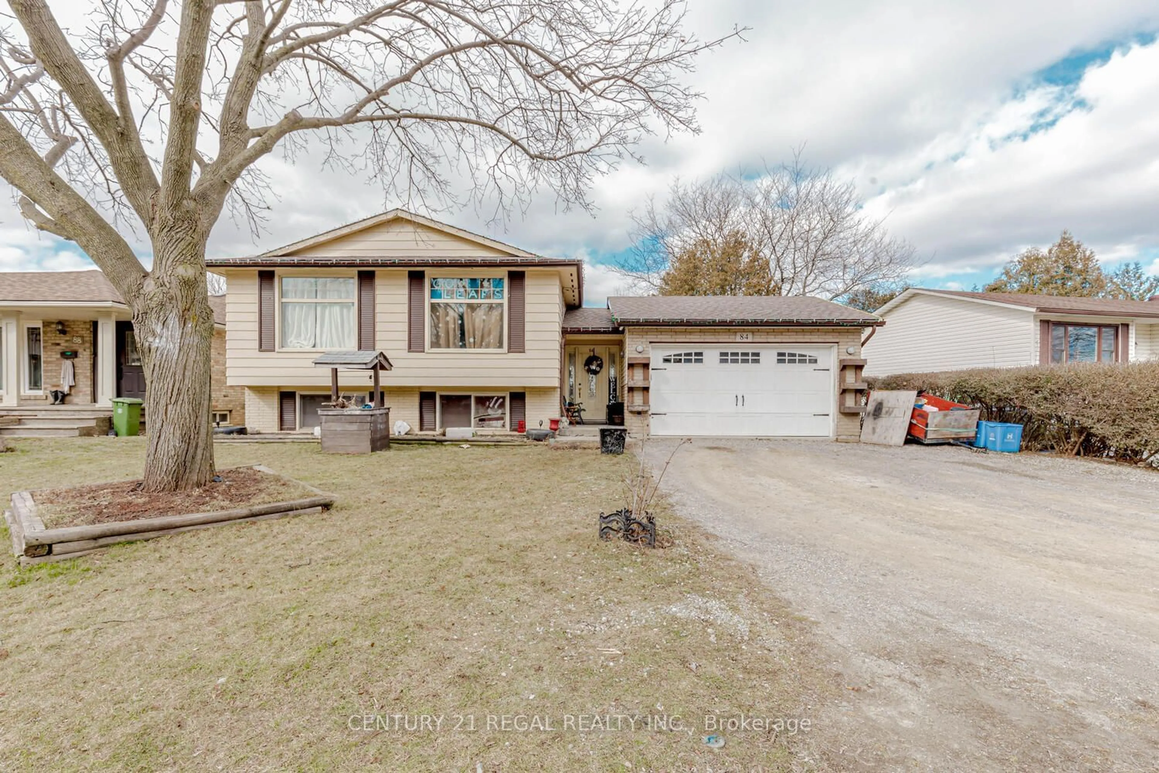 Frontside or backside of a home for 84 Elgar Ave, Hamilton Ontario L9C 4E5