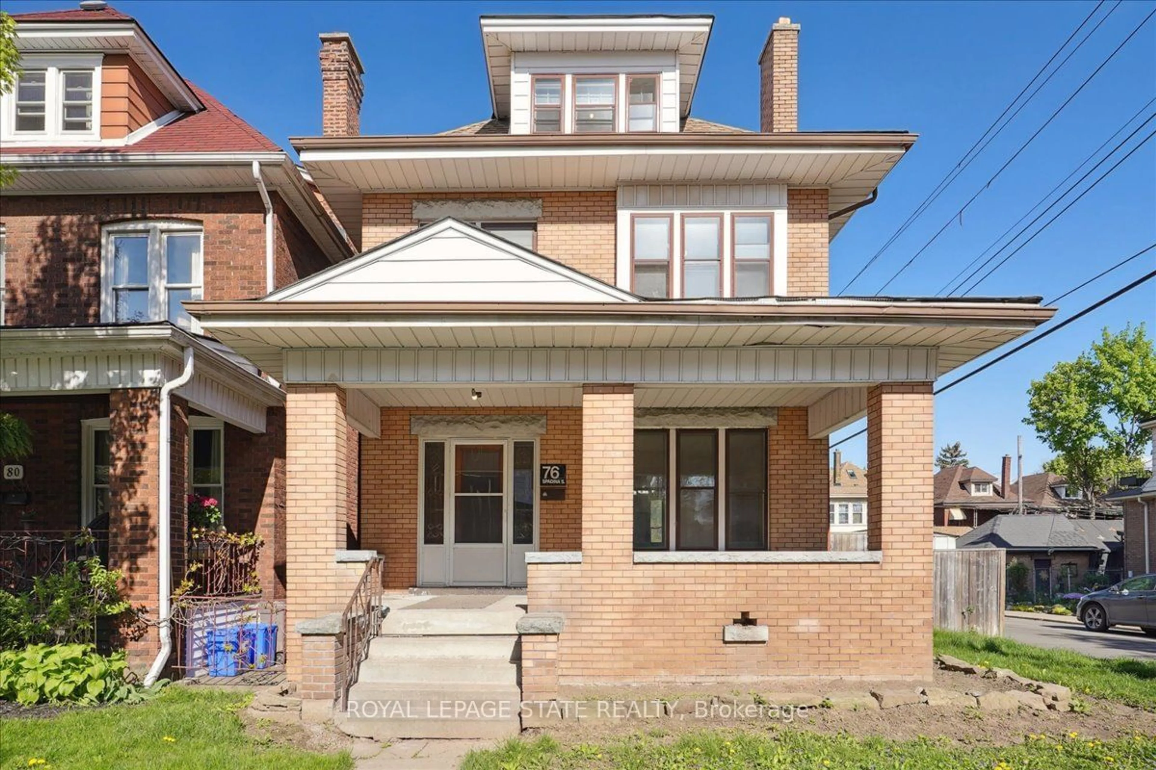 Home with brick exterior material for 76 Spadina Ave, Hamilton Ontario L8M 2X3