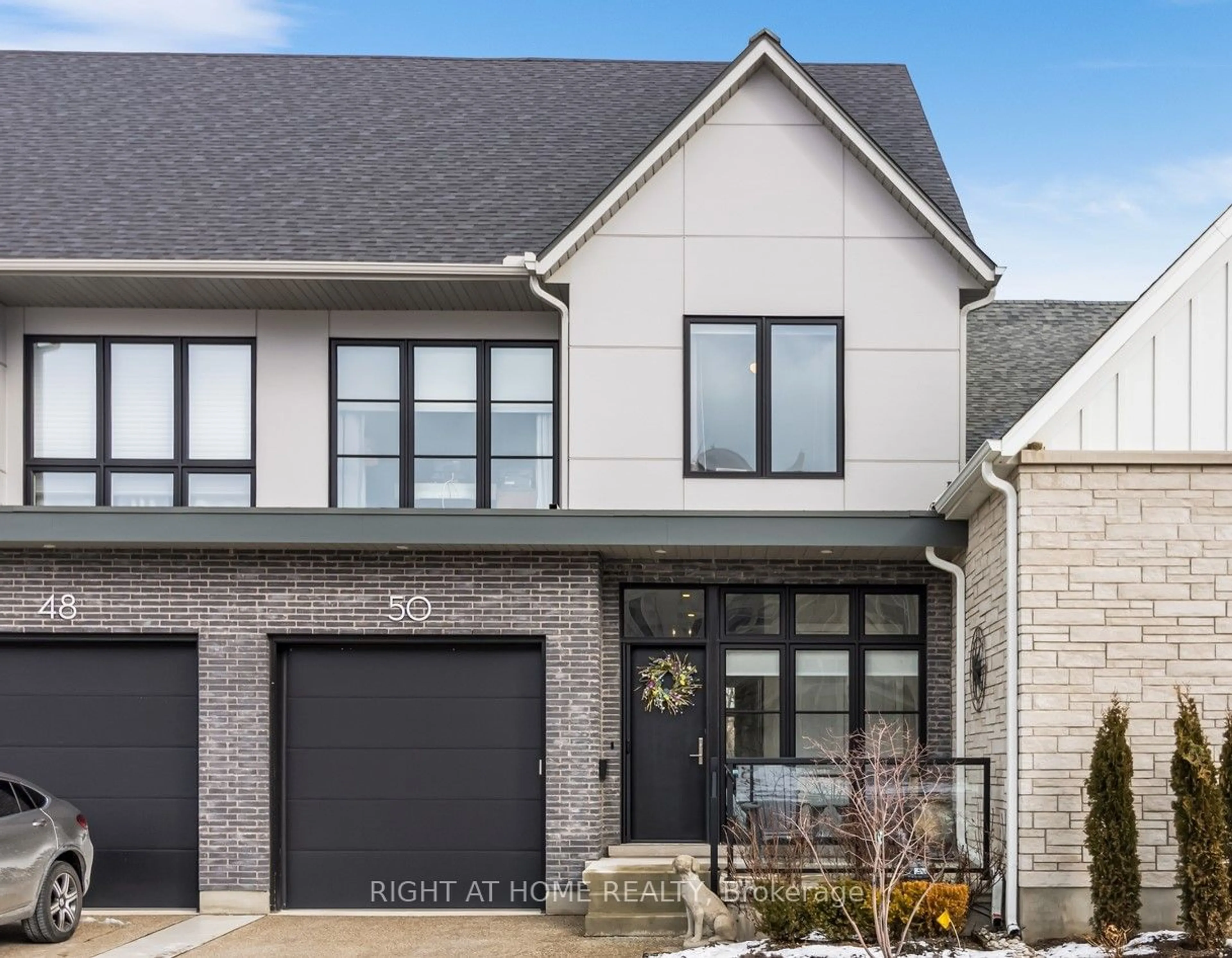 Home with brick exterior material for 50 Tulip Tree Common #4, St. Catharines Ontario L2S 4C8