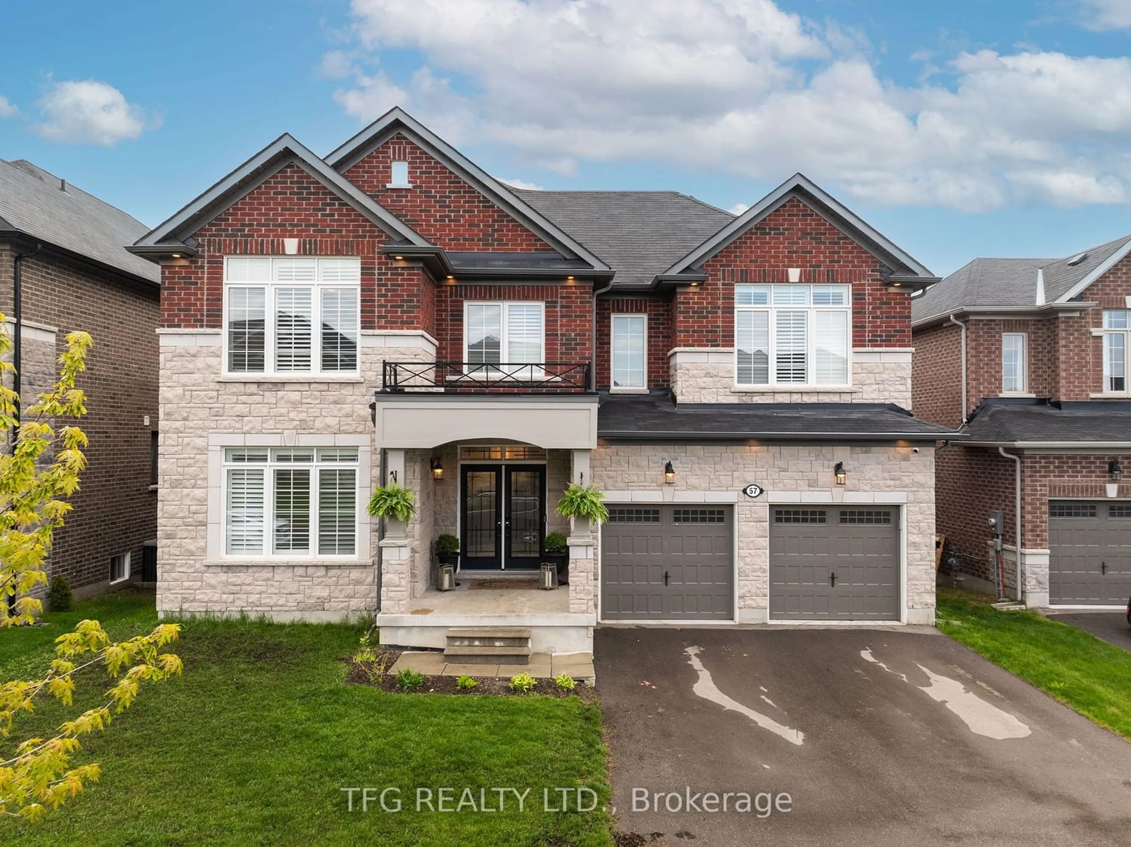 Home with brick exterior material for 57 Highlands Blvd, Cavan Monaghan Ontario L0A 1G0