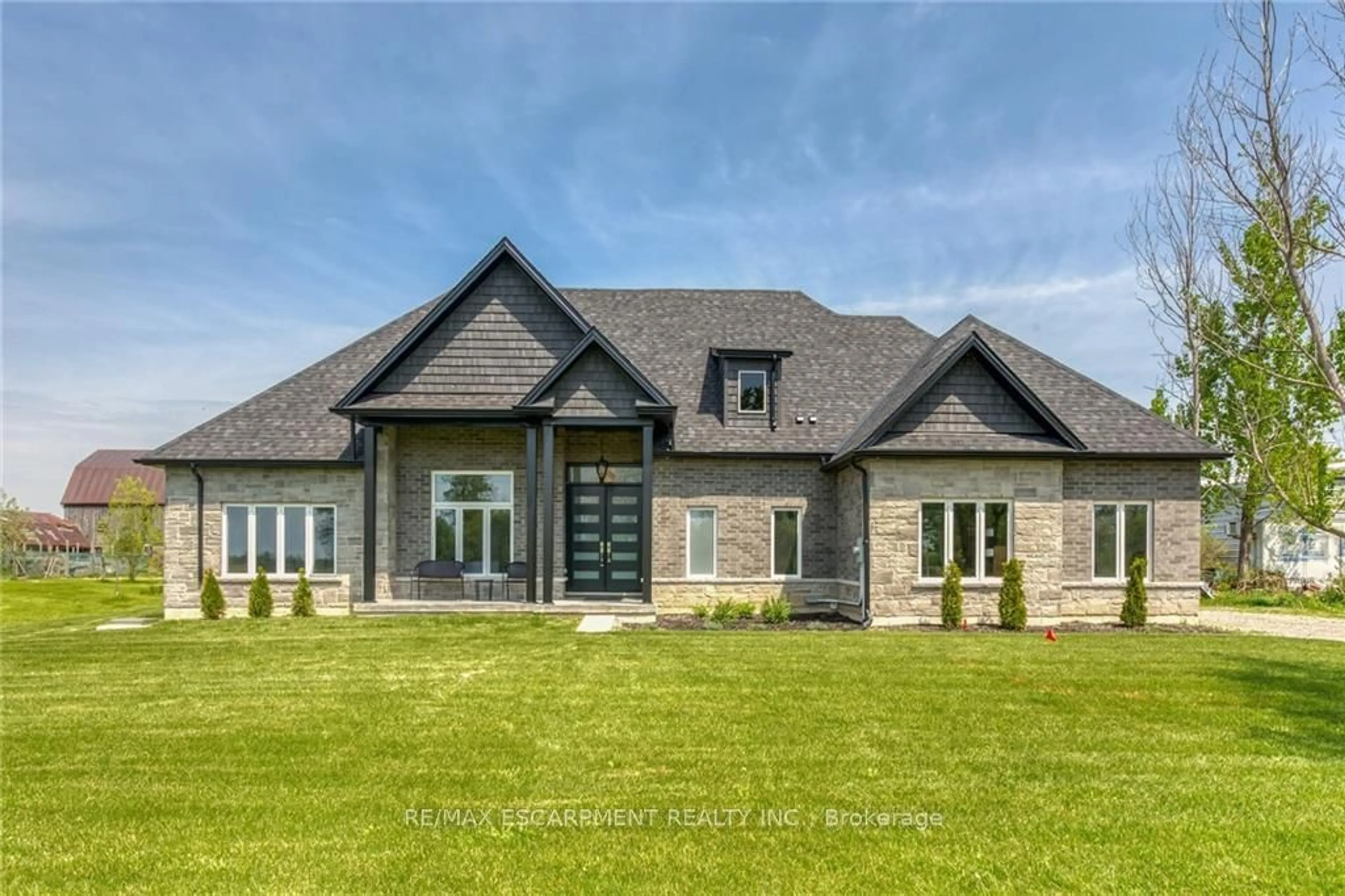 Home with brick exterior material for 389 Concession 4 Rd, Haldimand Ontario N0A 1G0